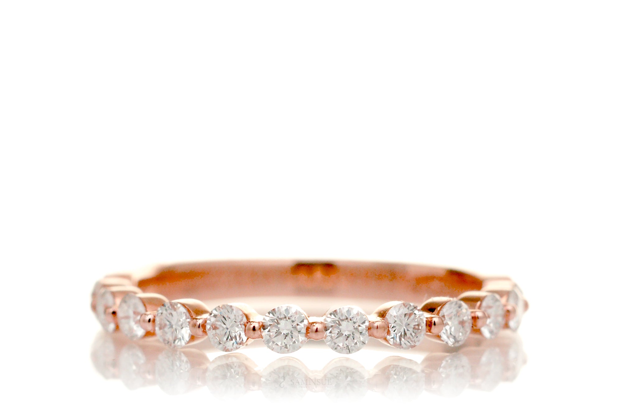 Floating diamond eternity on sale band rose gold