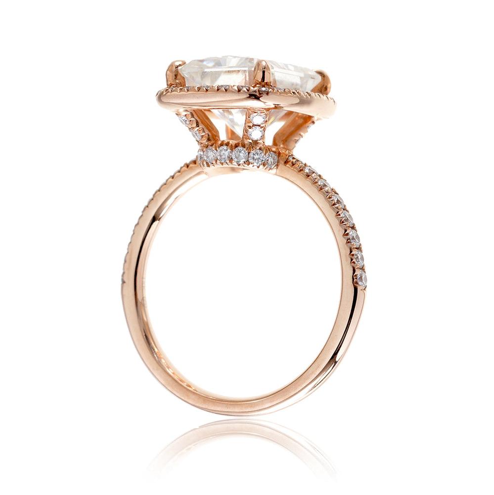 Radiant cut engagement ring with diamond halo and band the Drenched rose gold side view