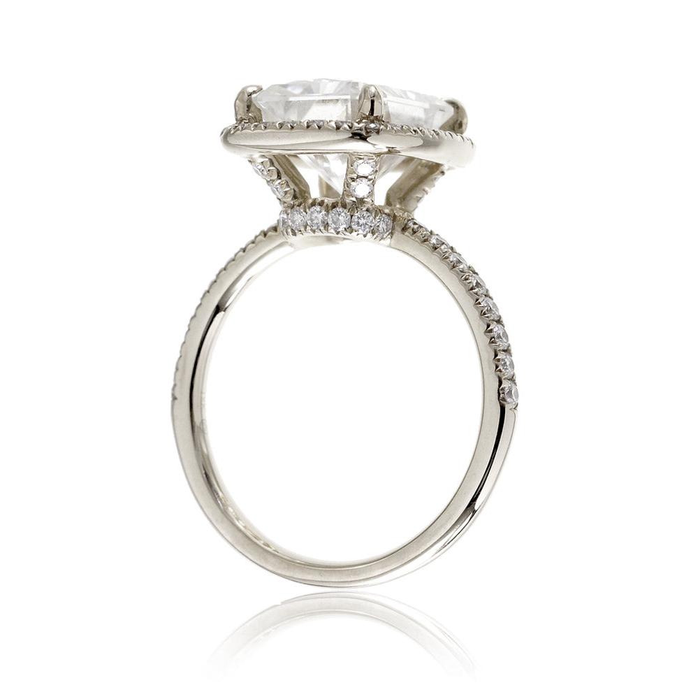 Radiant cut engagement ring with diamond halo and band the Drenched white gold side view