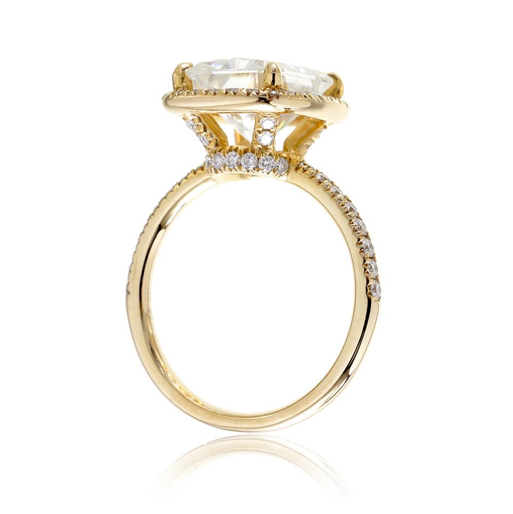 Radiant cut engagement ring with diamond halo and band the Drenched yellow gold side view