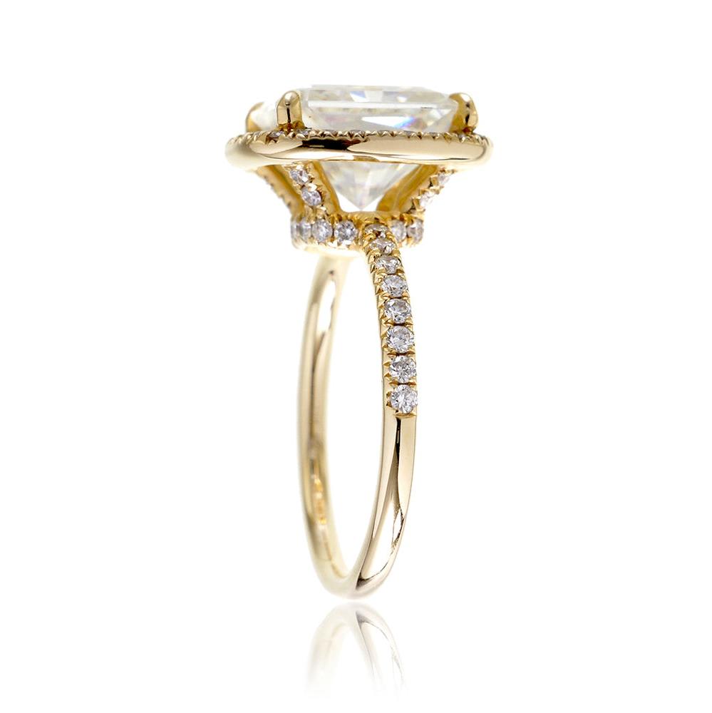 Radiant cut engagement ring with diamond halo and band the Drenched yellow gold profile view