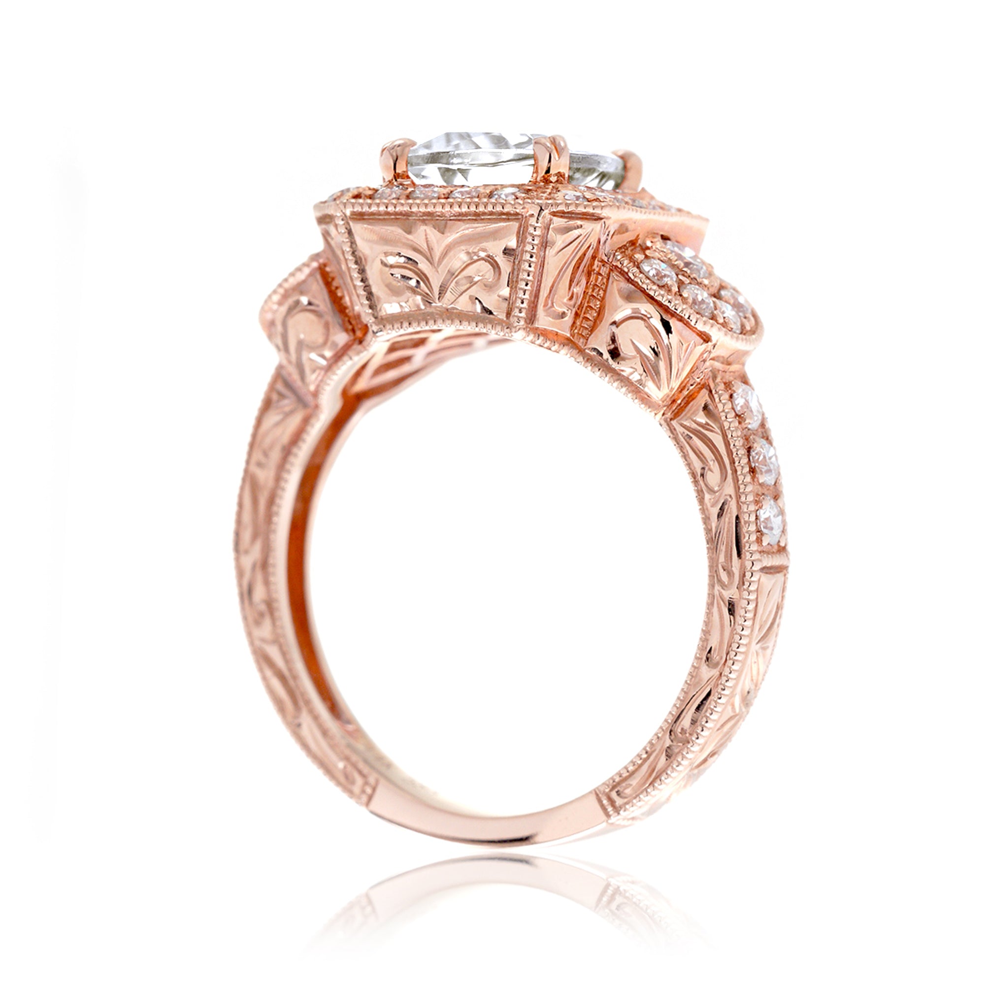 Cushion old miner's cut diamond in a vintage antique style engagement ring rose gold