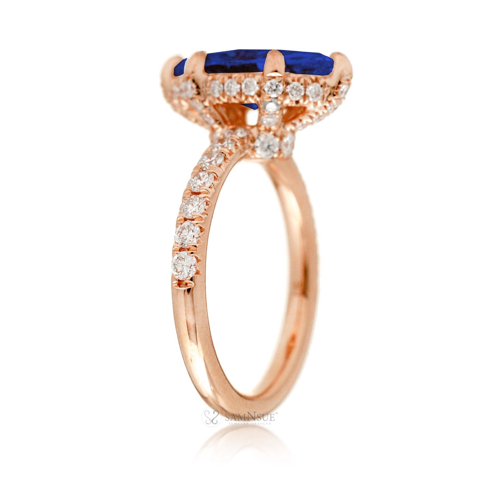 Marquise cut blue sapphire engagement ring with hidden halo and rounded diamond band for a comfort fit rose gold