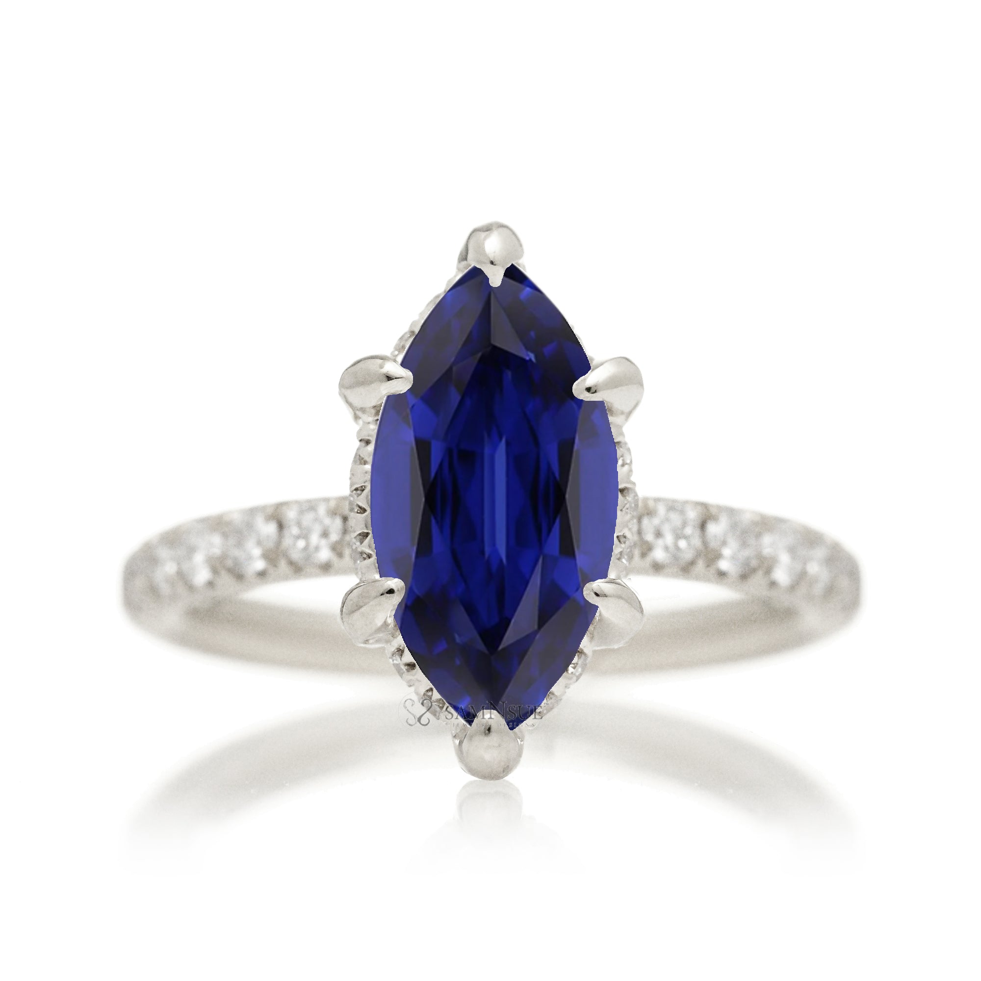 Marquise cut blue sapphire engagement ring with hidden halo and rounded diamond band for a comfort fit white gold