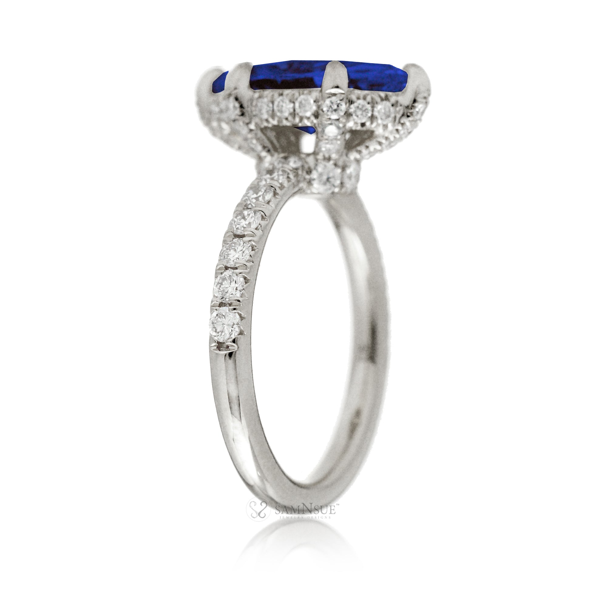 Marquise cut blue sapphire engagement ring with hidden halo and rounded diamond band for a comfort fit white gold