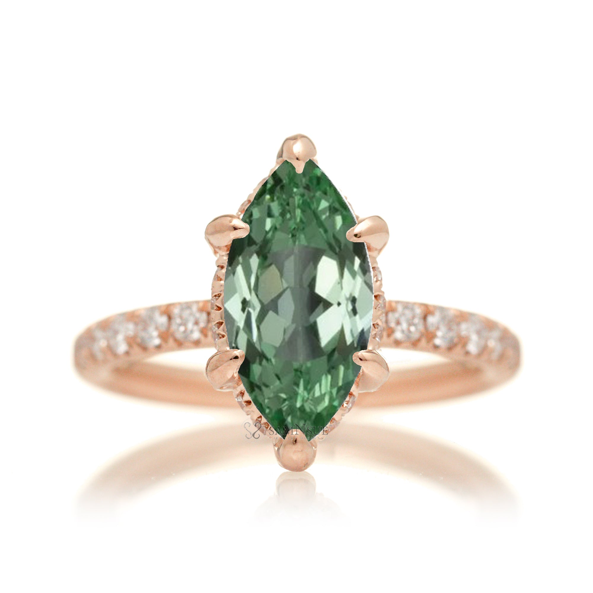 Green sapphire engagement ring with marquise and hidden diamond halo band in rose gold