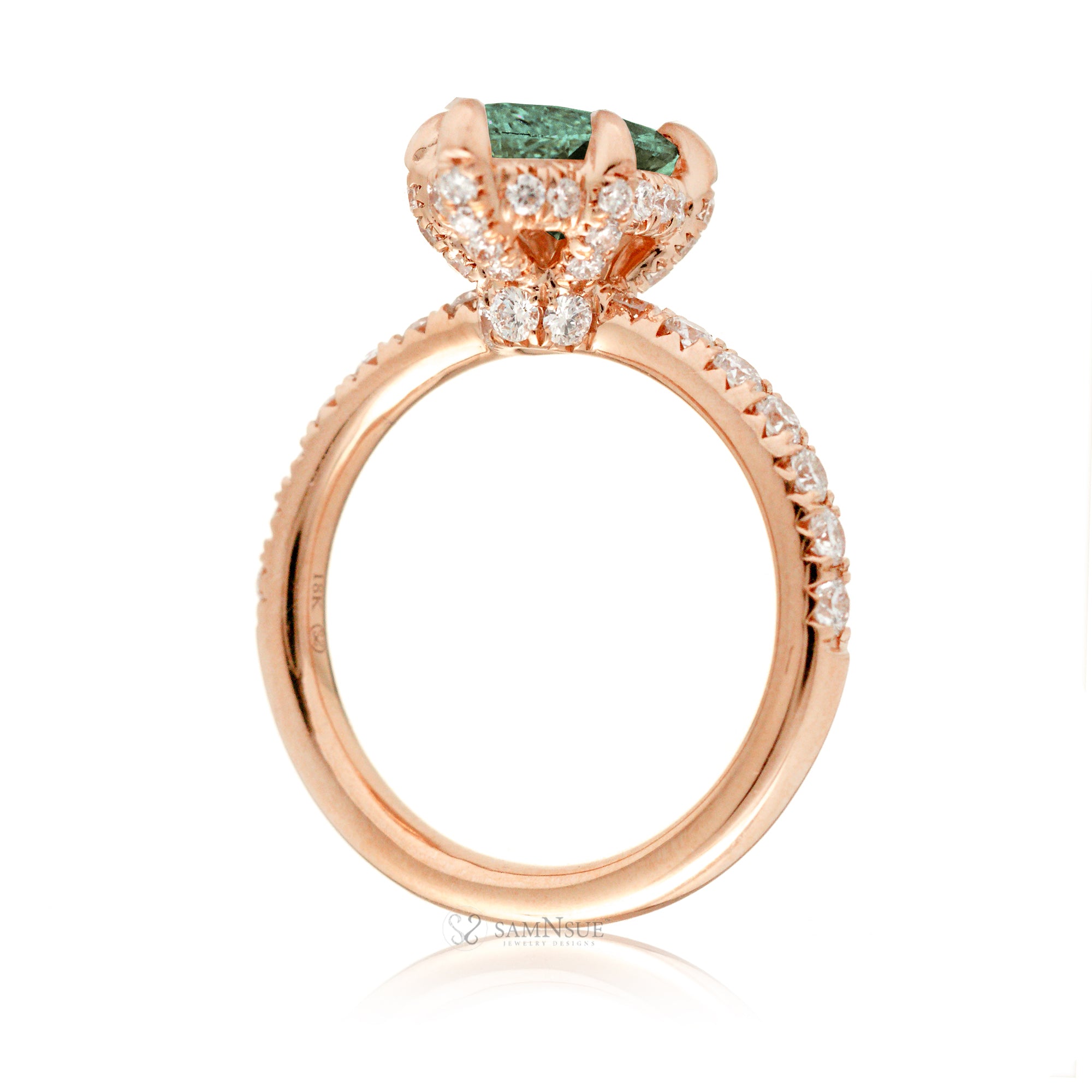 Green sapphire engagement ring with marquise and hidden diamond halo band in rose gold