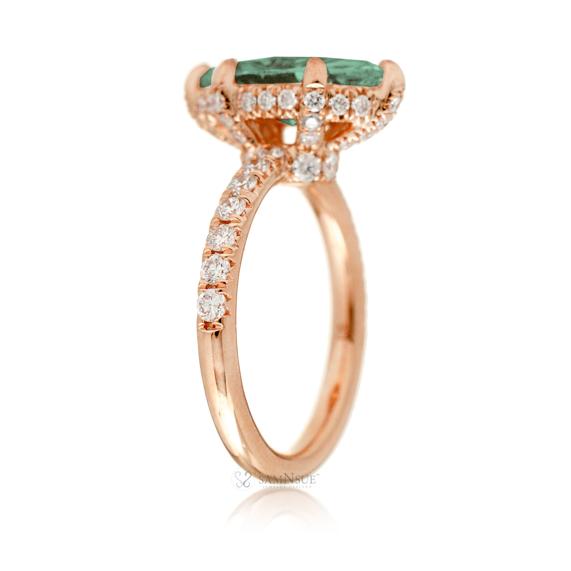 Green sapphire engagement ring with marquise and hidden diamond halo band in rose gold