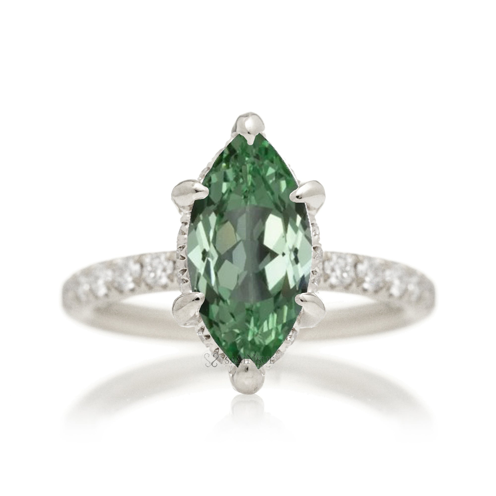 Green sapphire engagement ring with marquise and hidden diamond halo band in white gold