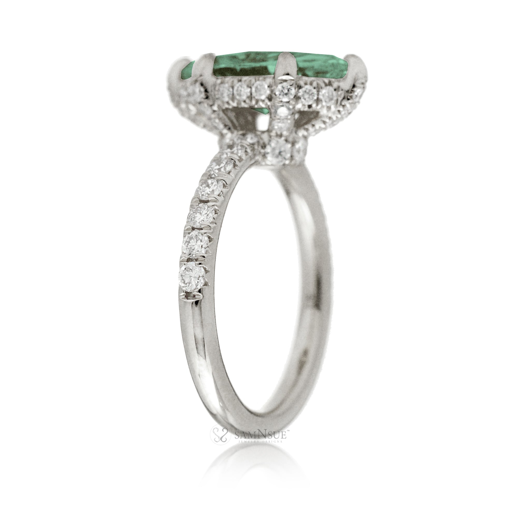 Green sapphire engagement ring with marquise and hidden diamond halo band in white gold