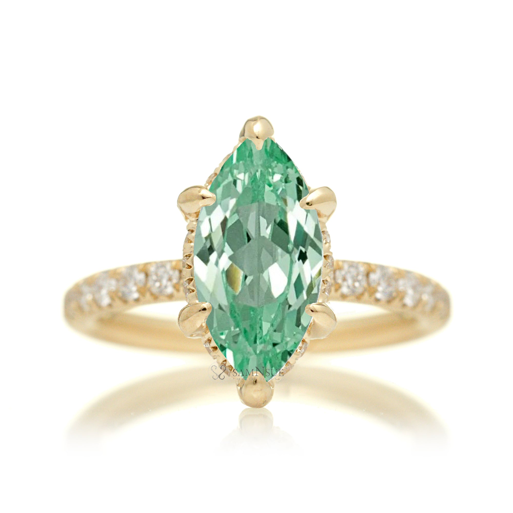 Mint Green sapphire engagement ring with marquise and hidden diamond halo band in yellow gold