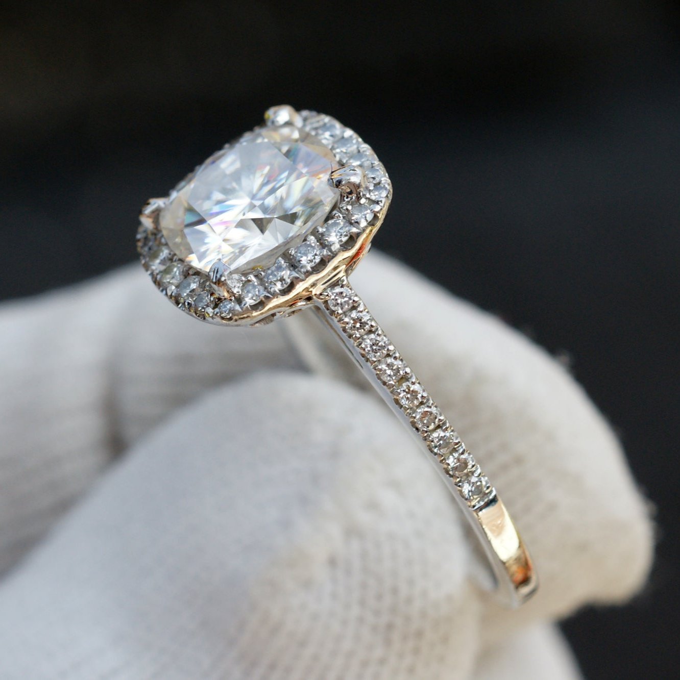 Cushion cut moissanite ring with diamond halo in white gold