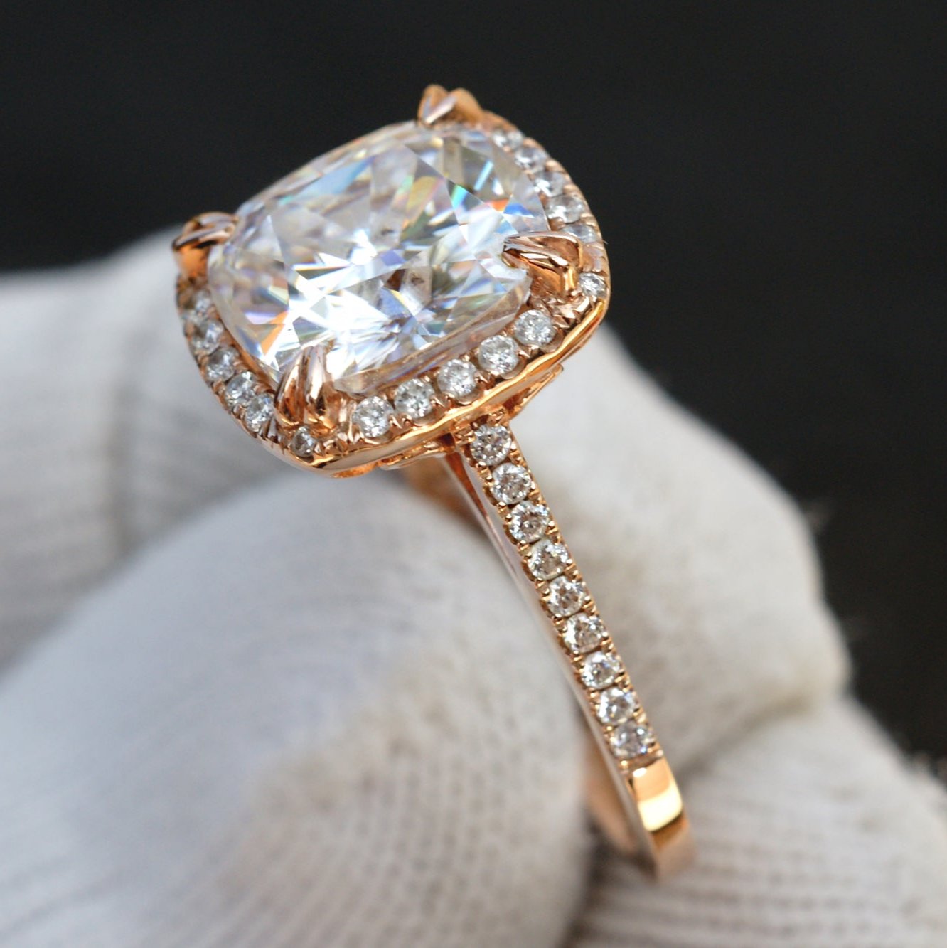 Cushion cut moissanite engagement ring with halo in rose gold