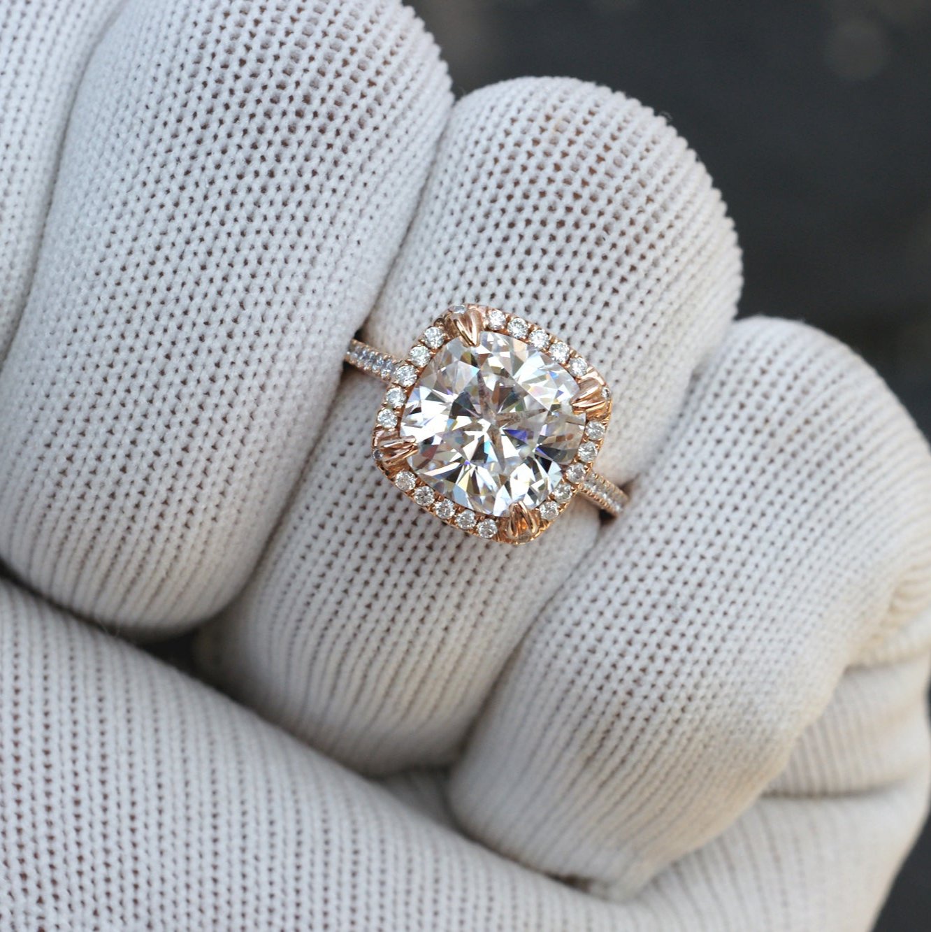 Cushion cut moissanite engagement ring with halo in rose gold