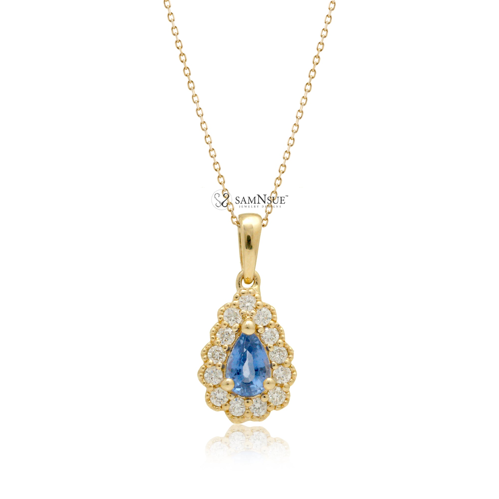 The Scallop Pear Cut Sapphire Diamond Halo Pendant (0.64ct. tw.)