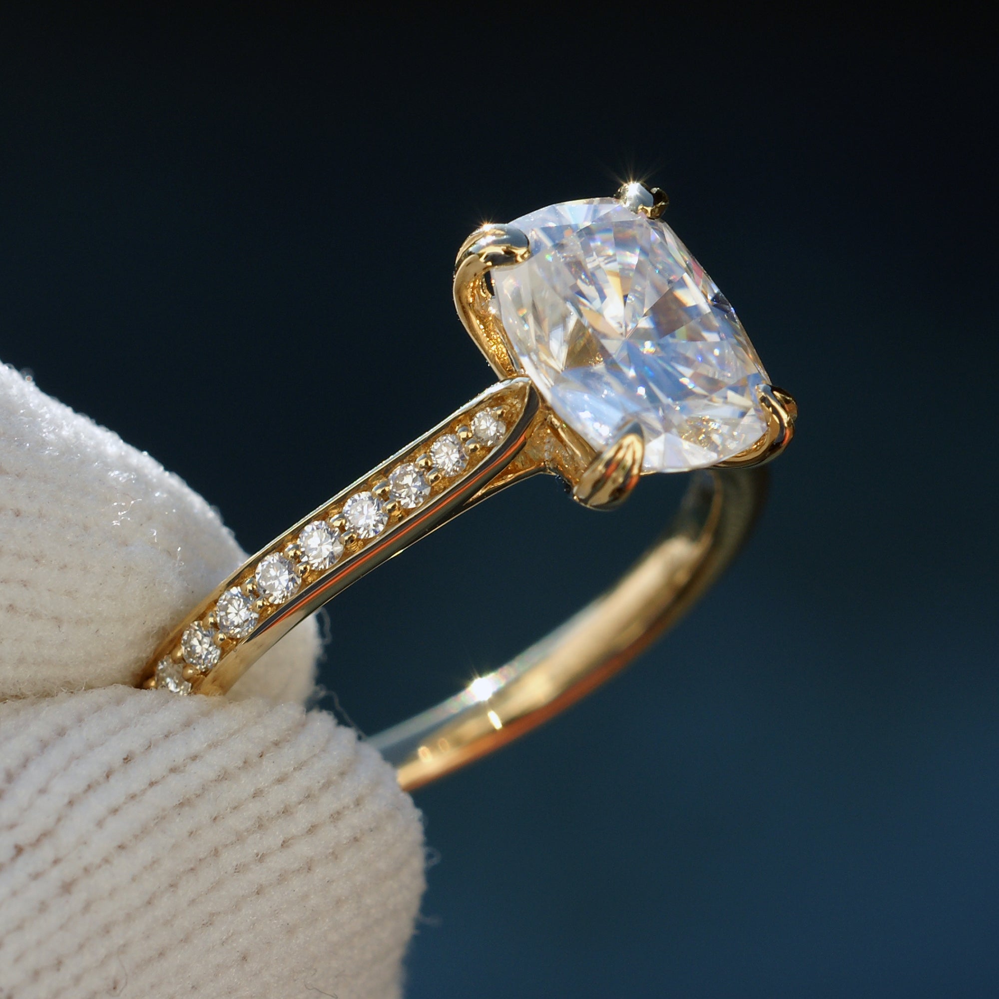 Cushion moissanite engagement ring with diamond band on yellow gold - the Emily 9x7mm