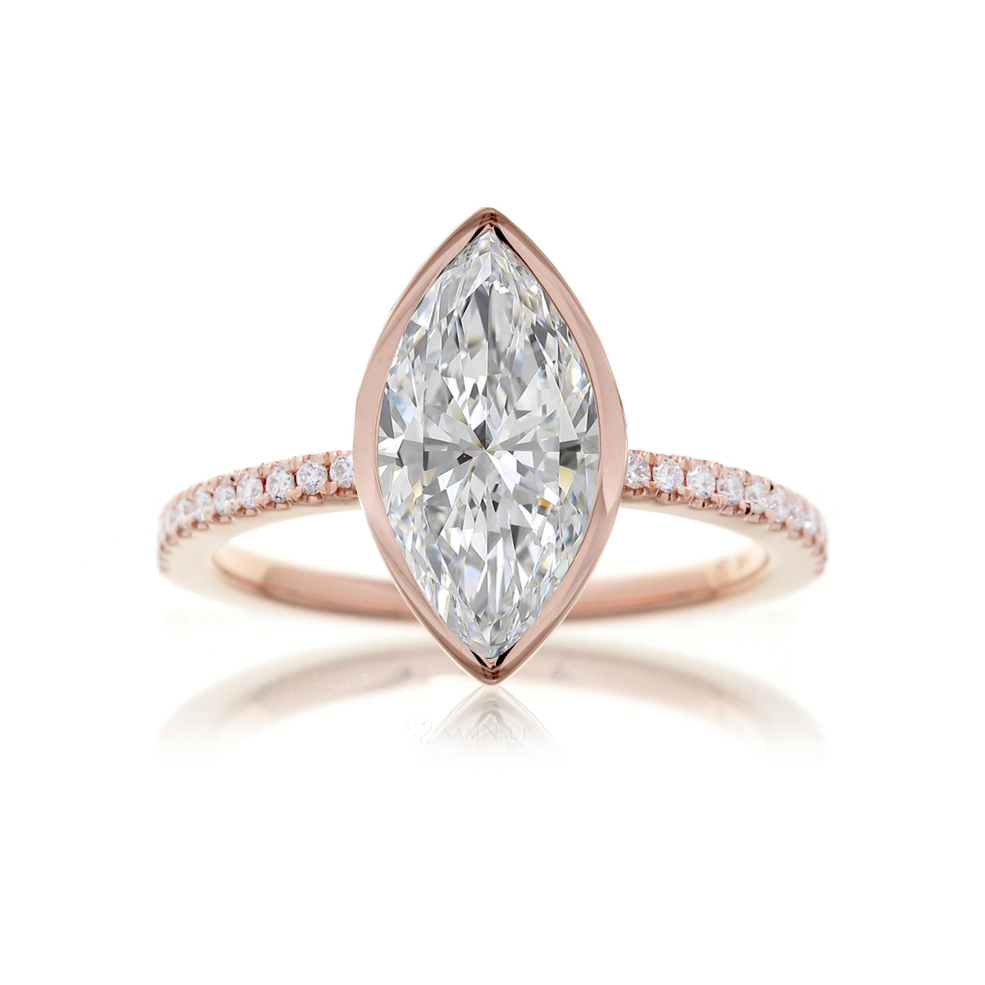 Marquise cut bezel set engagement ring in rose gold