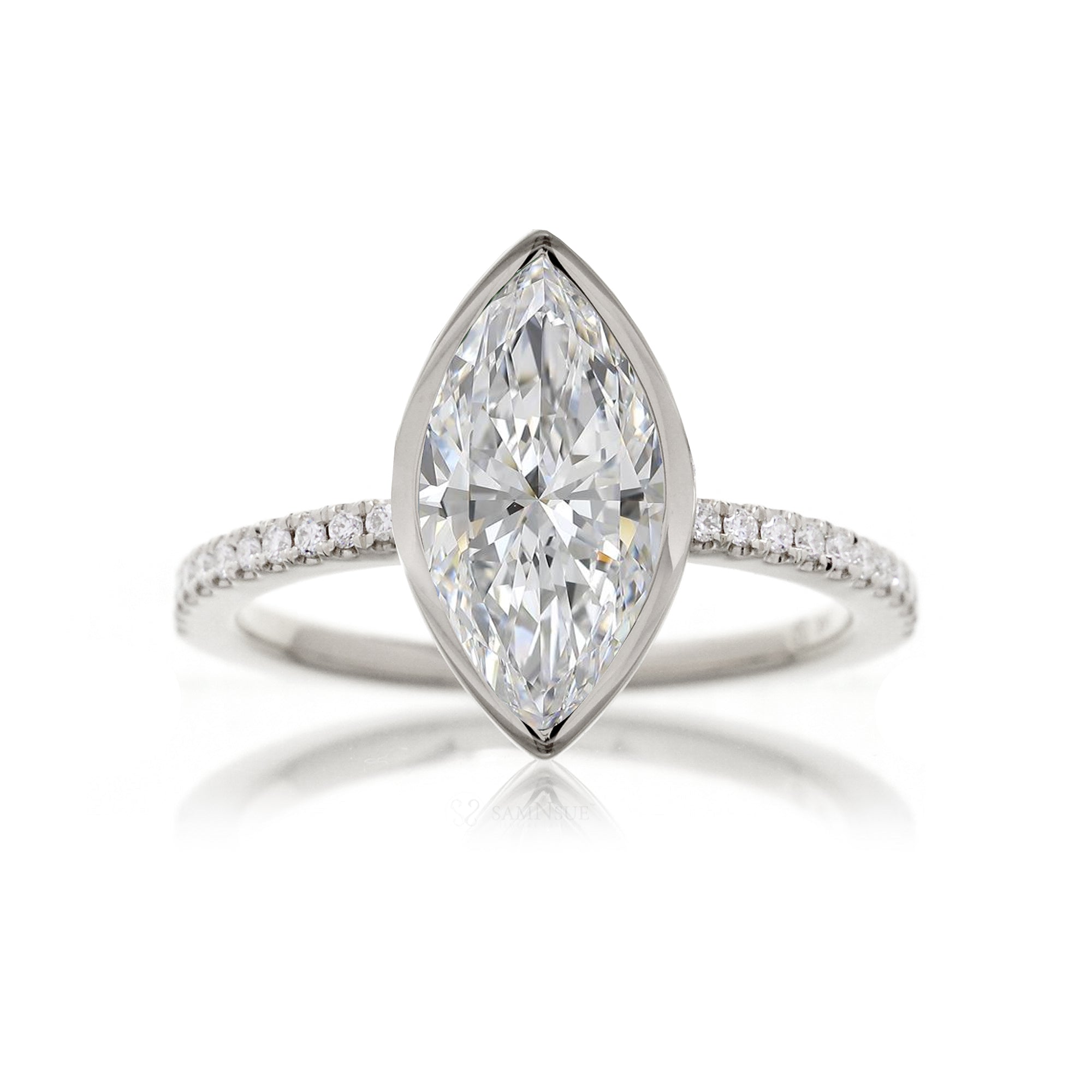 Marquise cut bezel set engagement ring in white gold