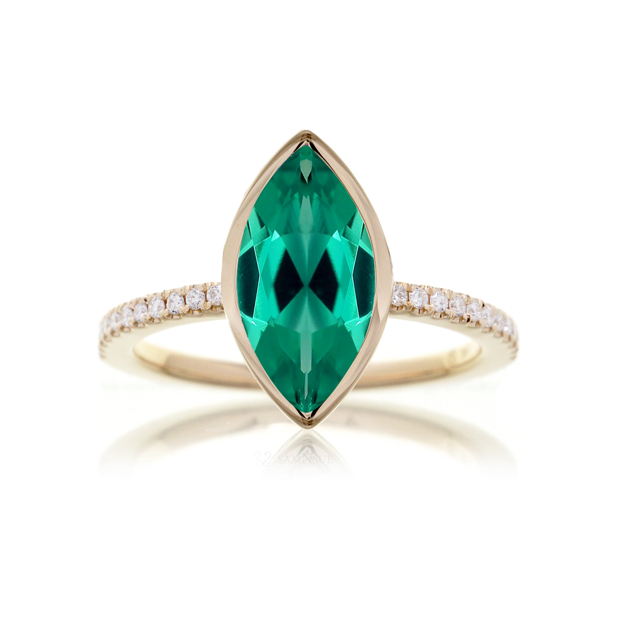 Marquise cut green emerald bezel solitaire diamond ring The Beverly yellow gold