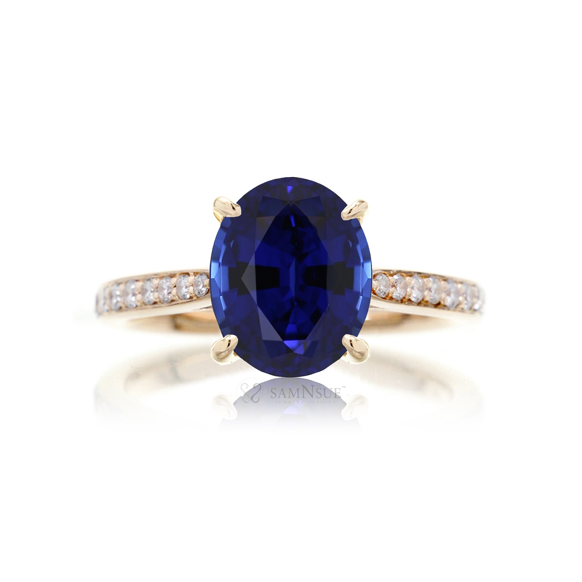 Oval cut blue sapphire engagement ring in yellow gold the Emily