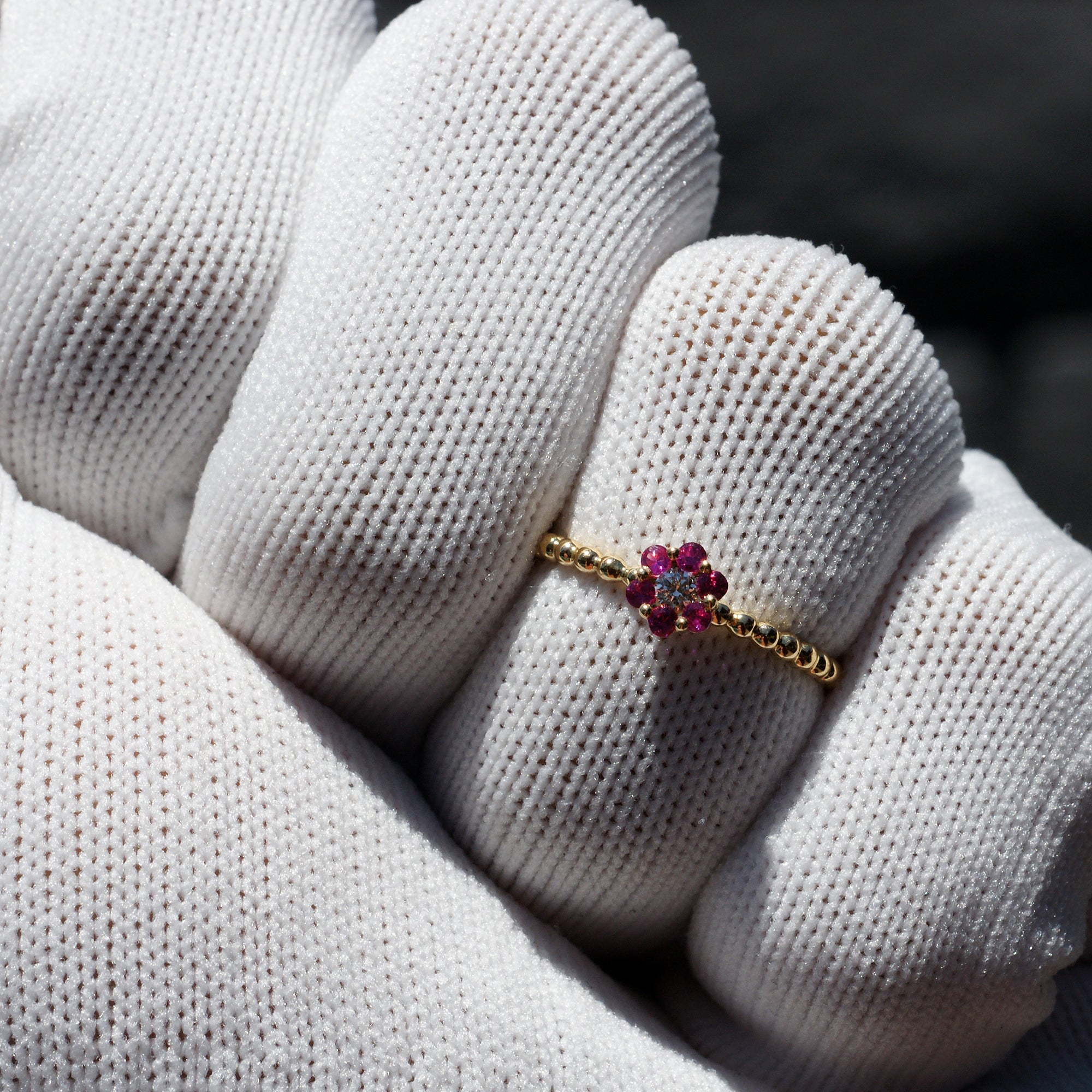 Flower ruby and diamond ring with beaded yellow gold band