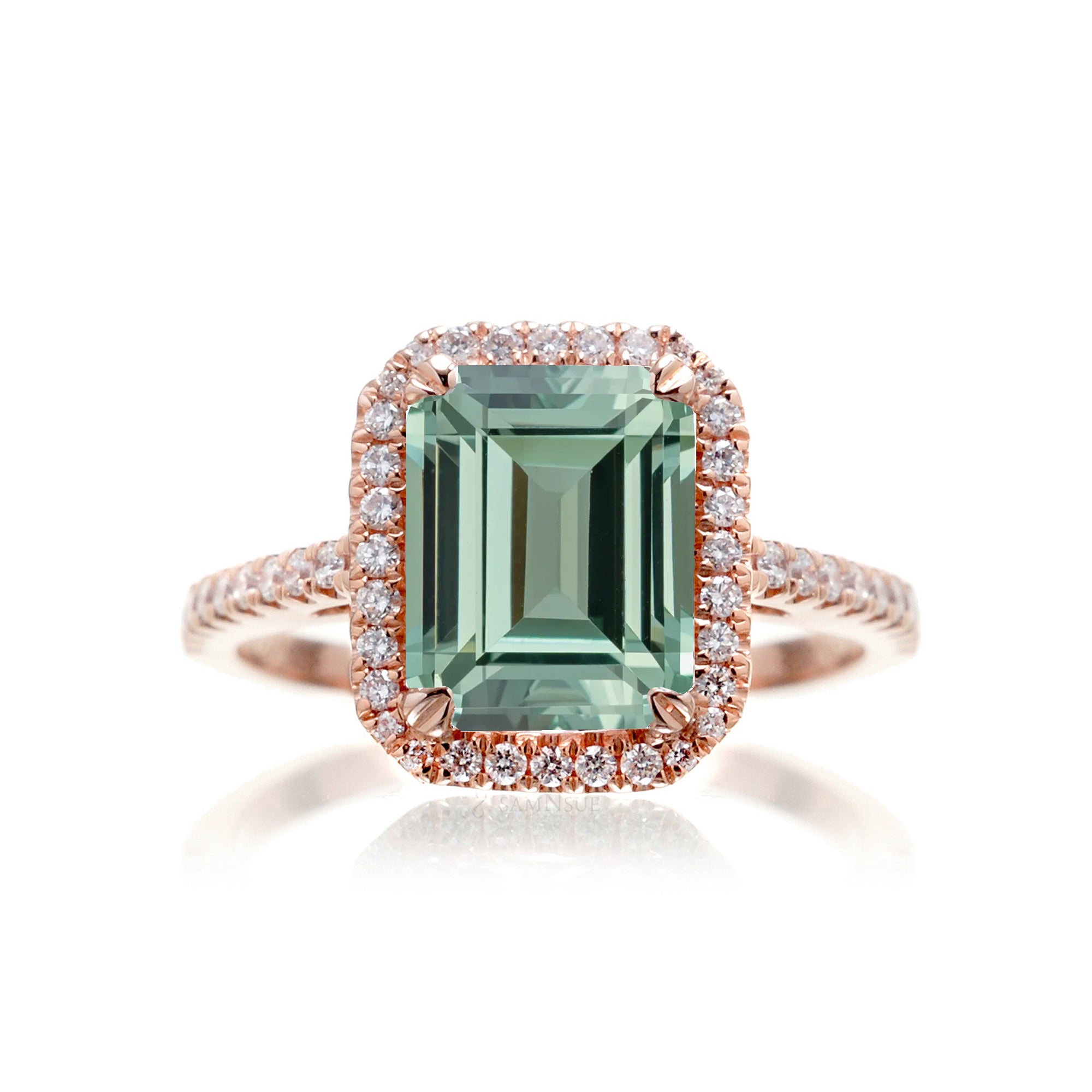 Green emerald step cut engagement ring in rose gold