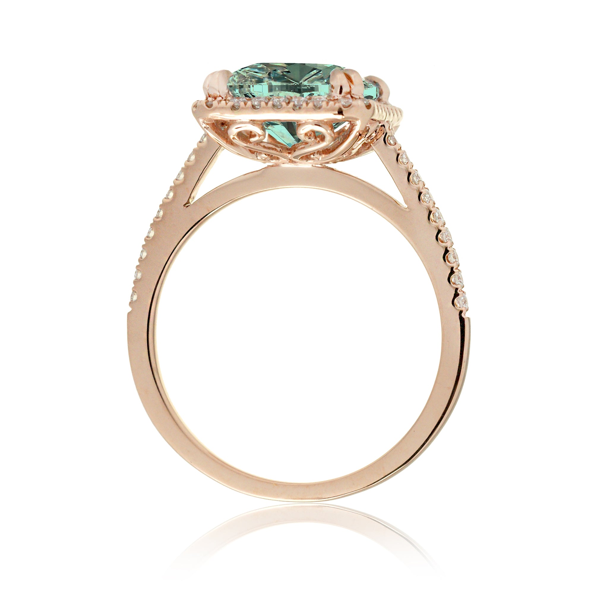 Green emerald step cut engagement ring in rose gold