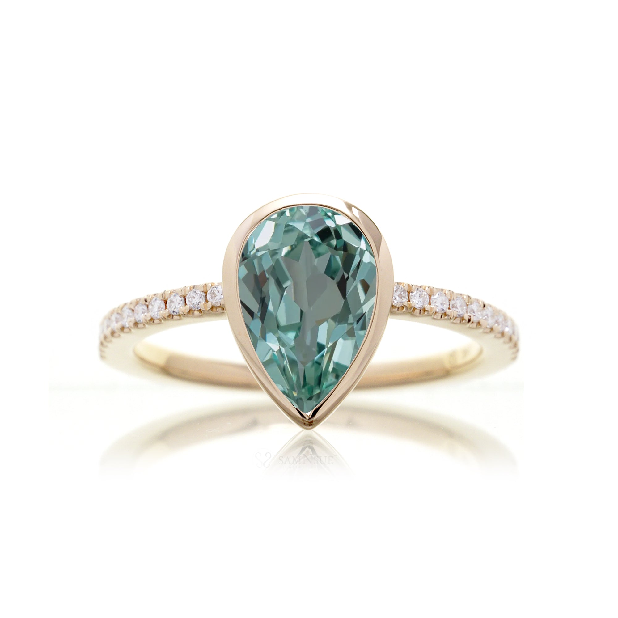 Pear green sapphire bezel set ring The Beverly yellow gold