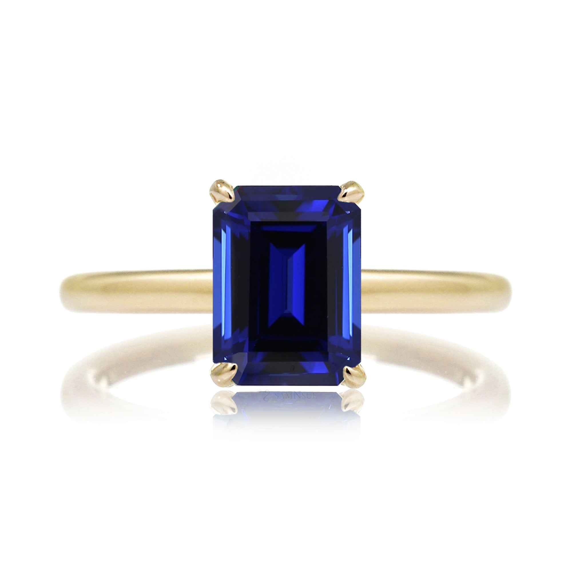 Emerald cut sapphire ring clearance yellow gold