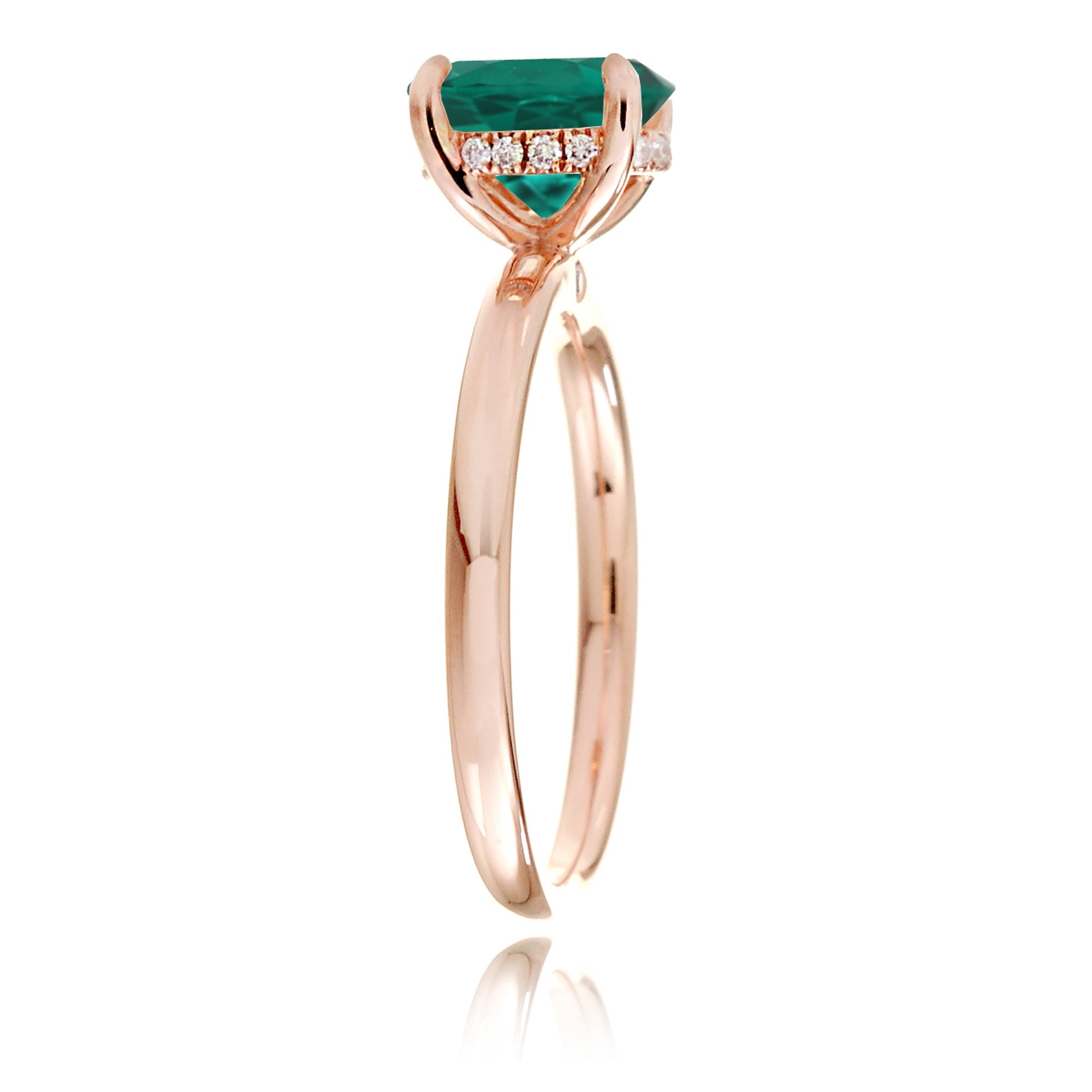 Oval cut green emerald ring with diamond hidden halo on rose gold