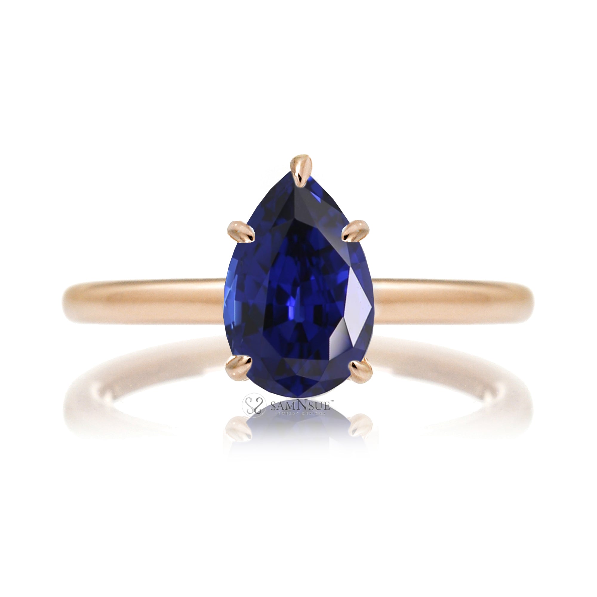 Pear blue sapphire solitaire engagement ring in rose gold with hidden halo