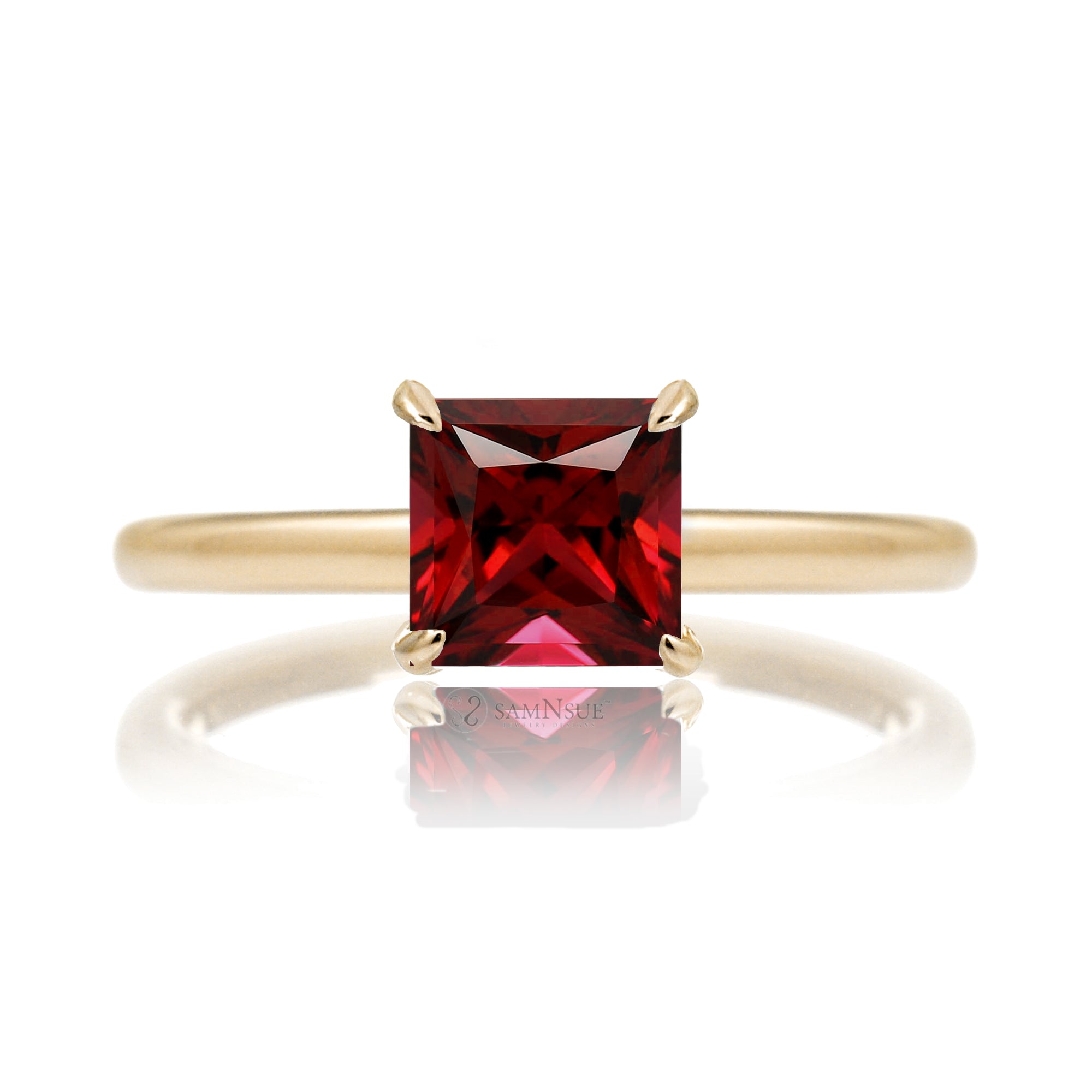 Ruby ring with princess cut and hidden halo with a rounded yellow gold band