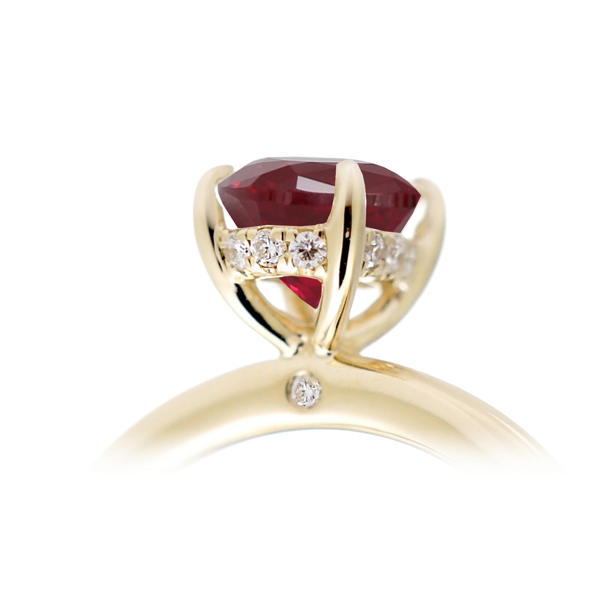 Ruby ring with princess cut and hidden halo with a rounded yellow gold band