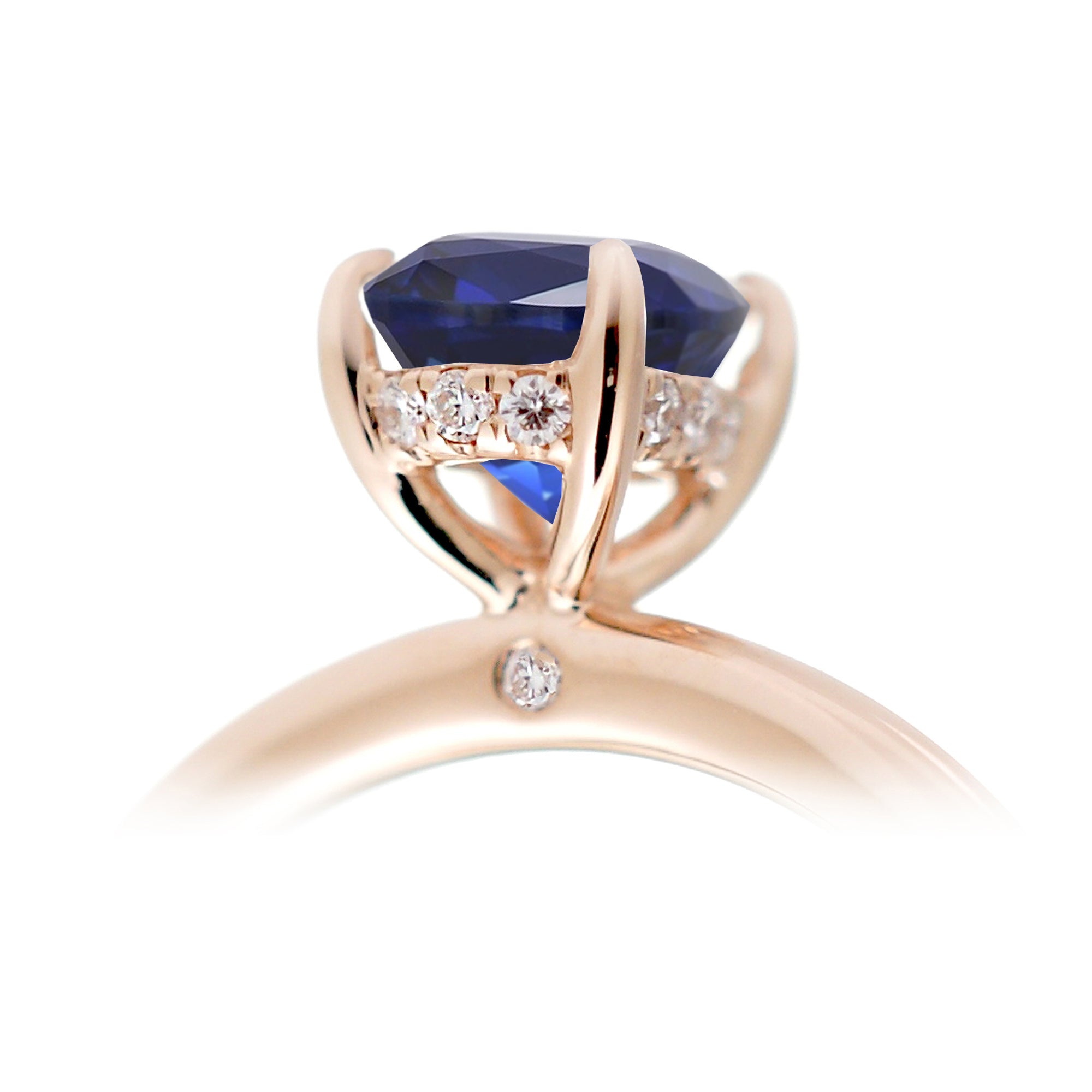 Princess cut blue sapphire solitaire ring in rose gold