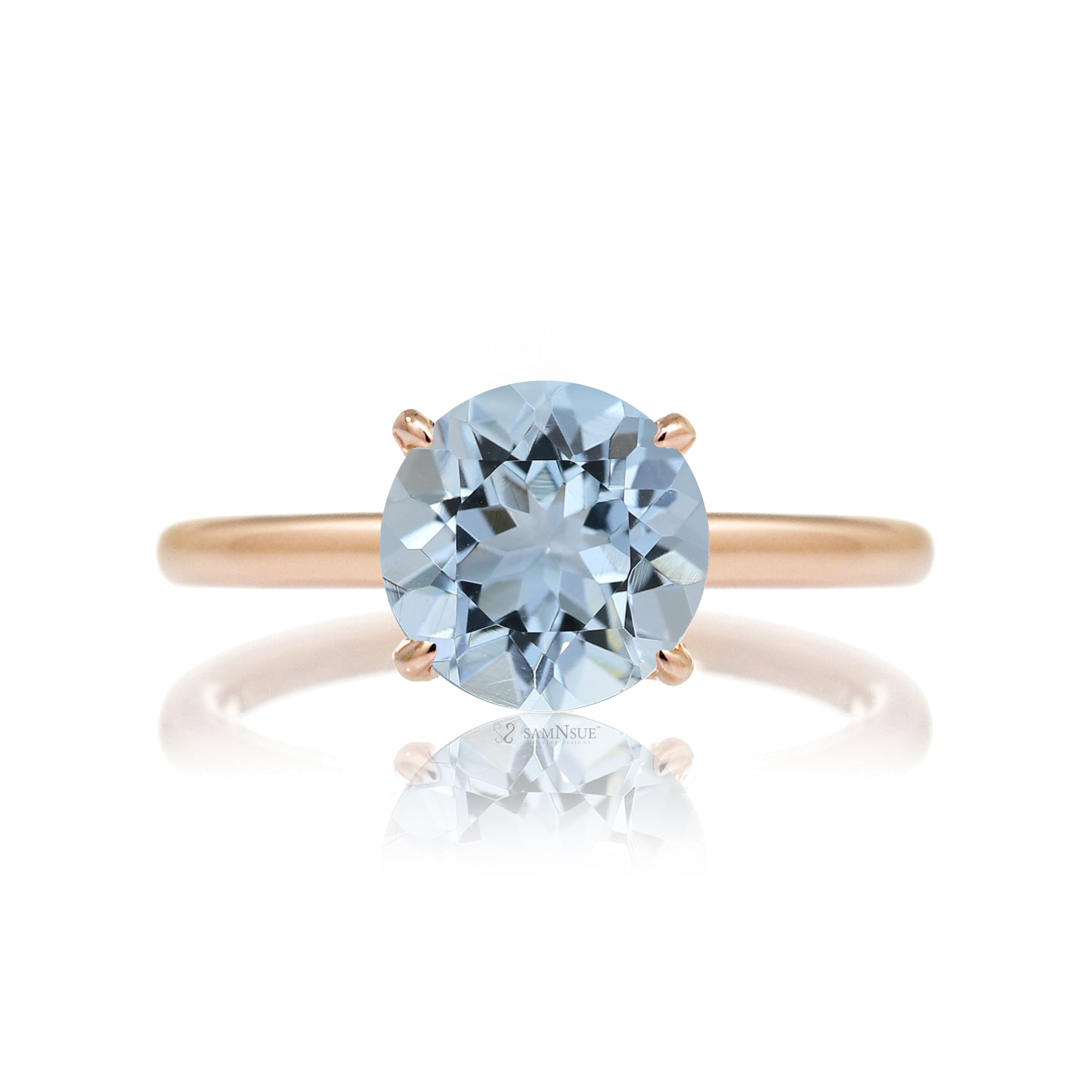 Round aquamarine ring with a diamond hidden halo in rose gold