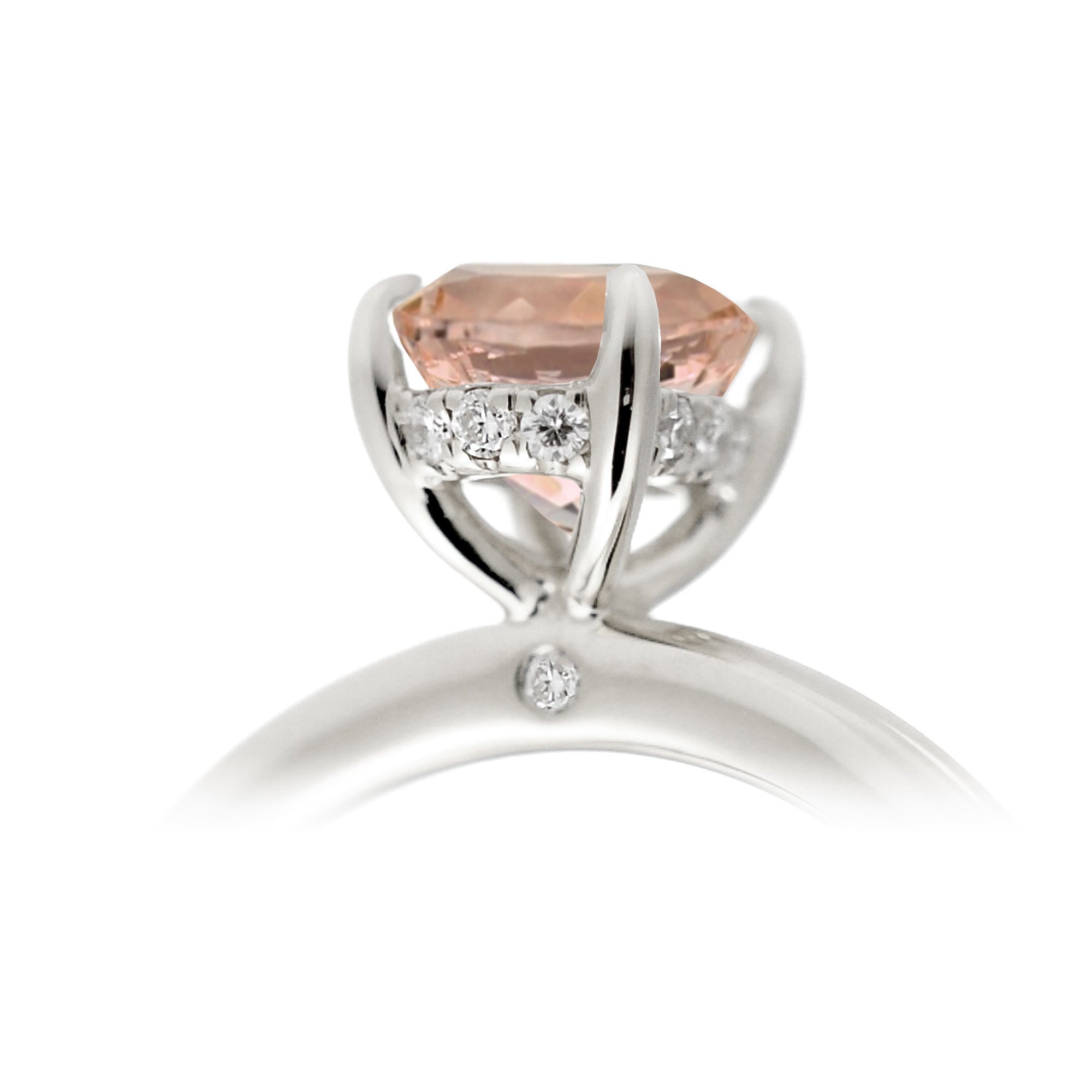 Round morganite ring with hidden halo in white gold