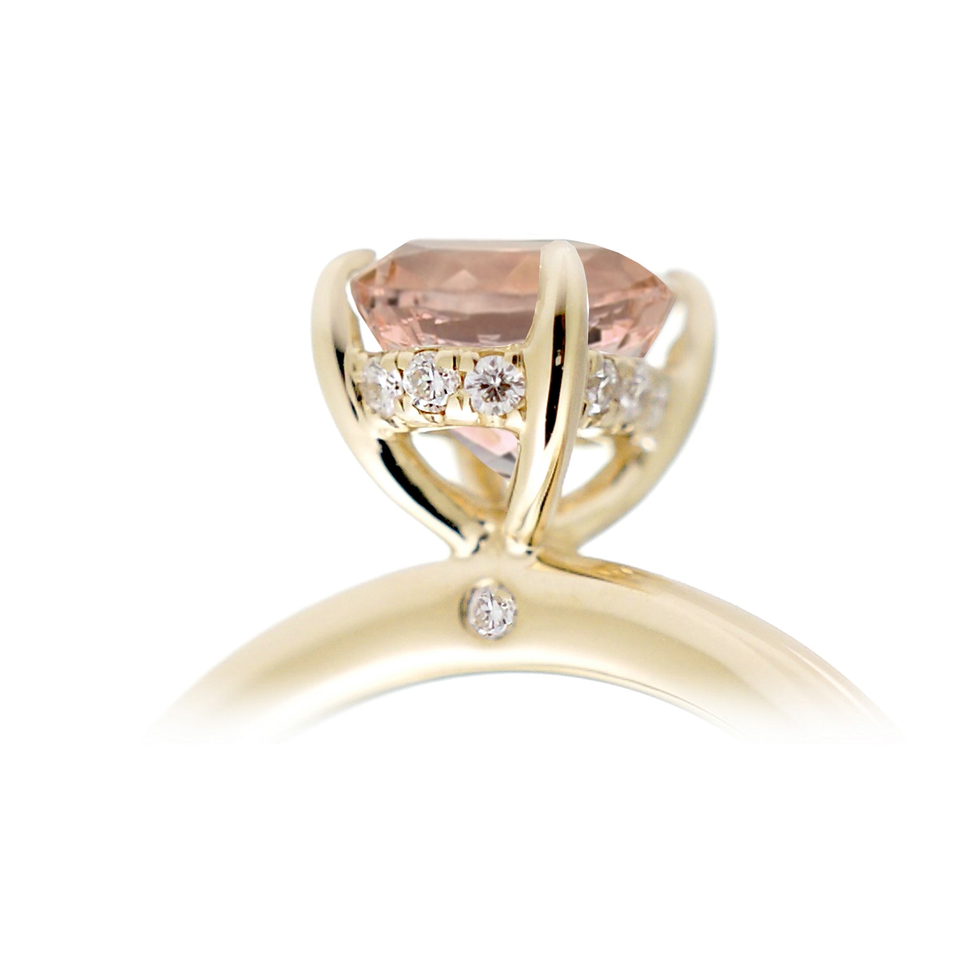 Round morganite ring with hidden halo in yellow gold