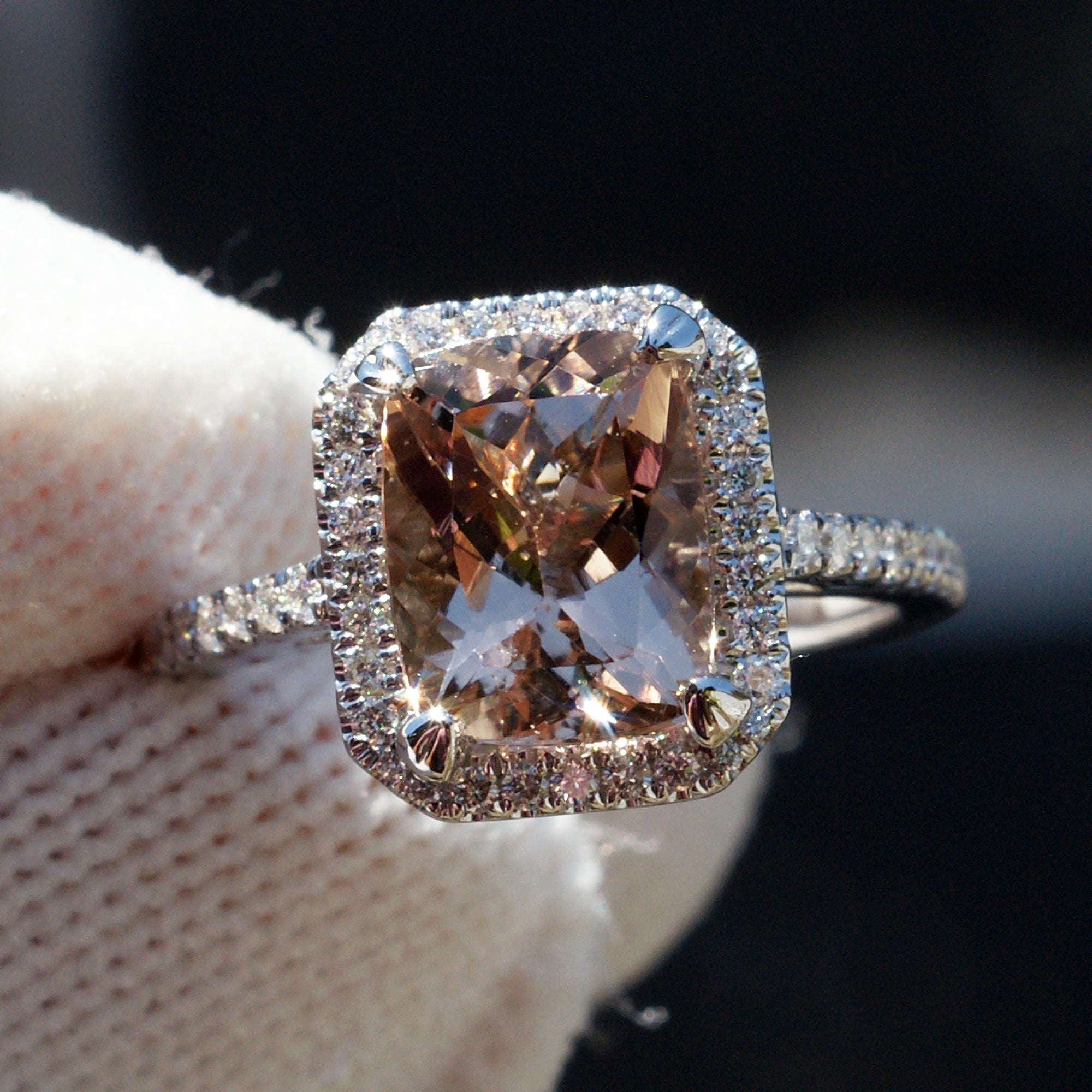 Cushion morganite engagement ring in white gold with diamond halo and band