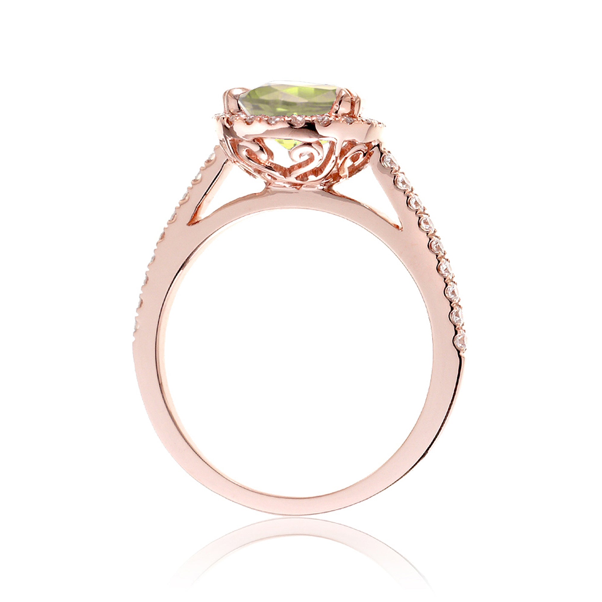 Oval cut yellow sapphire engagement ring with a diamond halo in rose gold