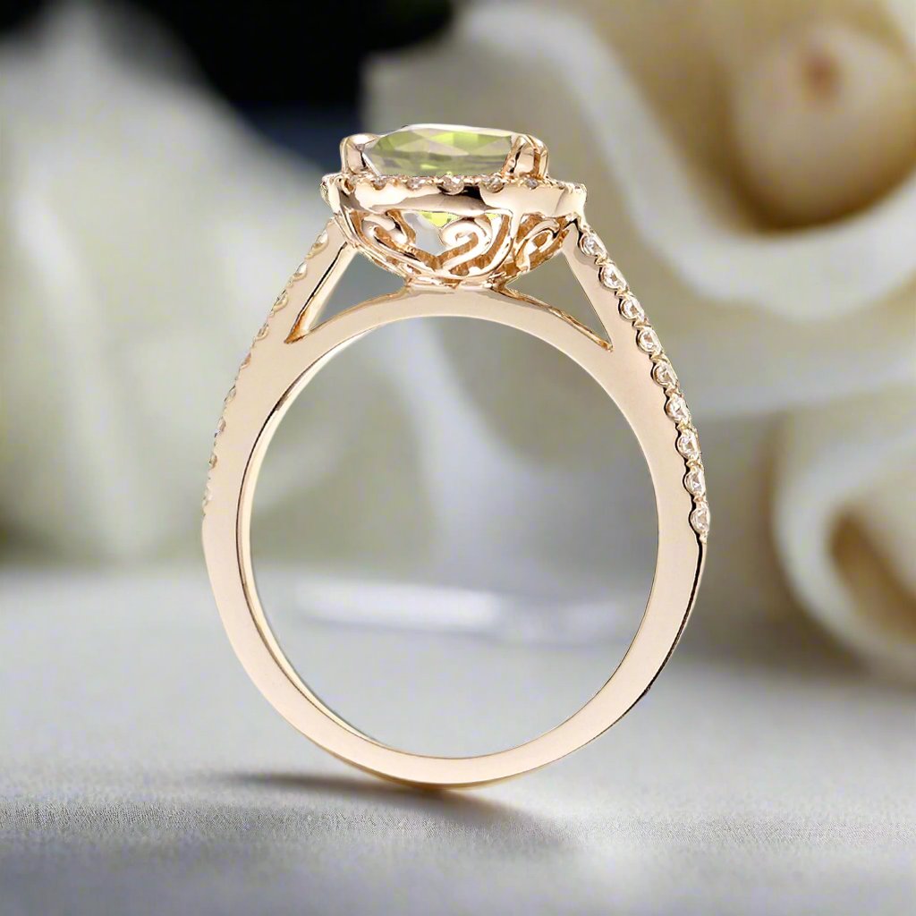 Oval cut yellow sapphire engagement ring with a diamond halo in yellow gold