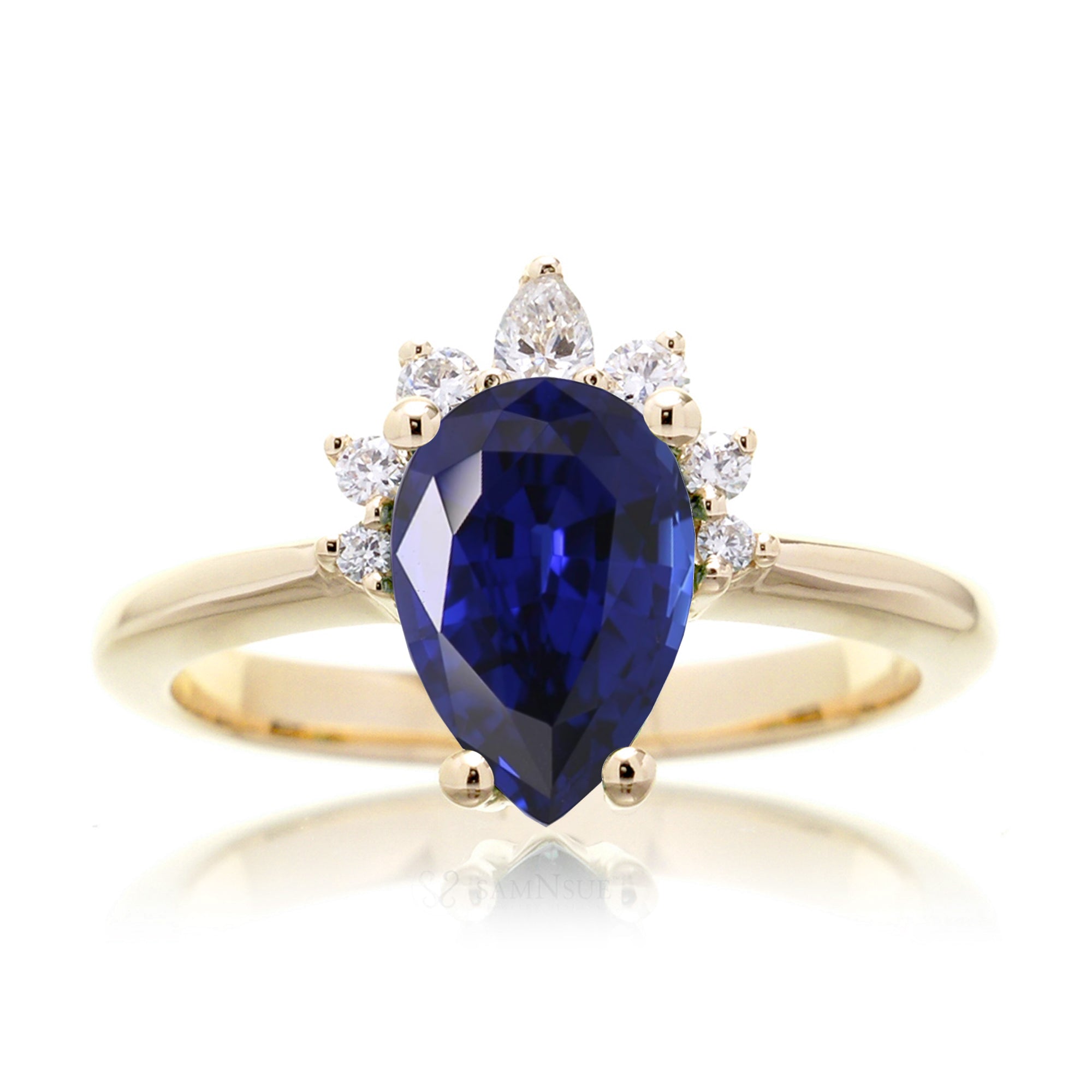 Pear blue sapphire solitaire with half diamond halo and solid band yellow gold