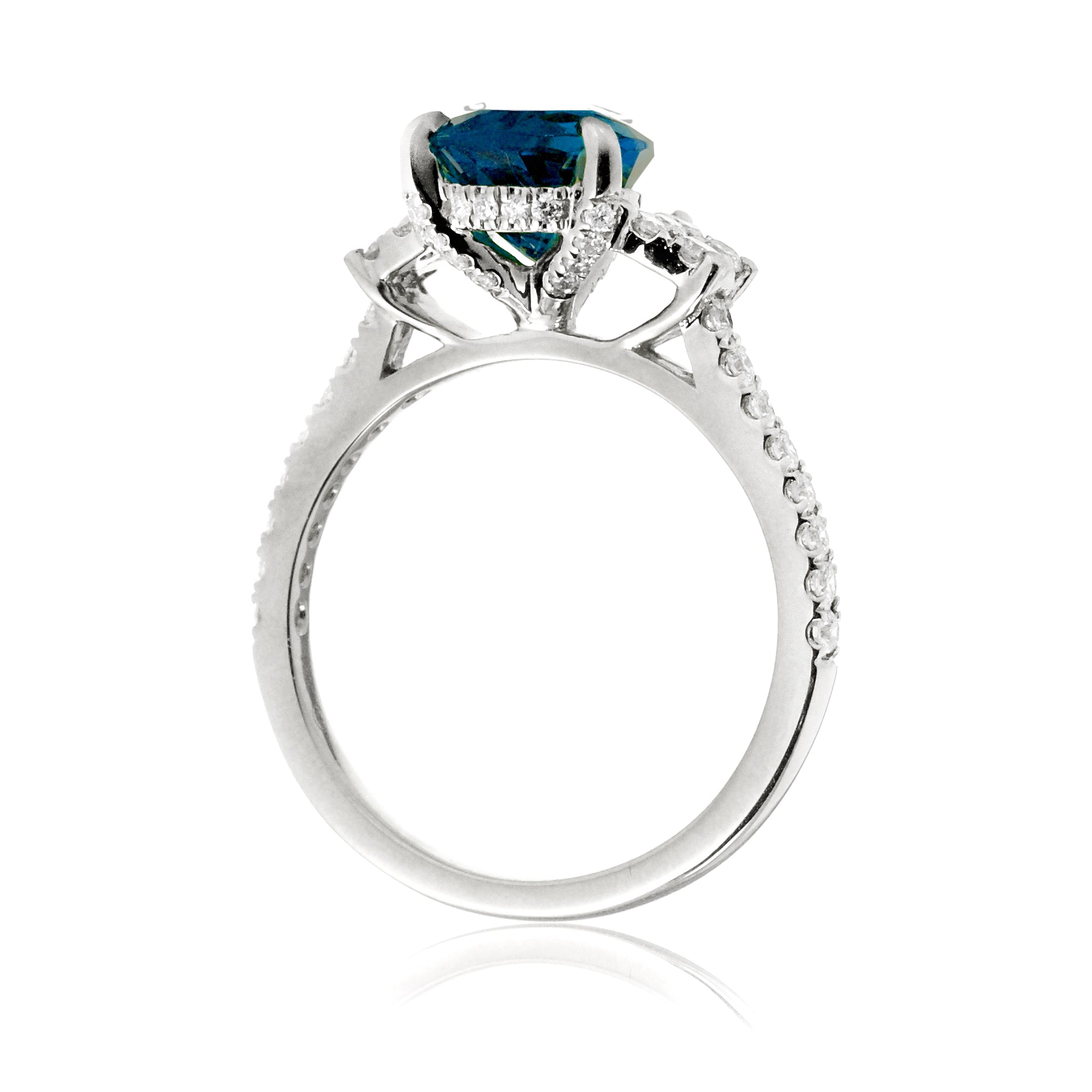 Pear blue sapphire and diamond band engagement ring in white gold