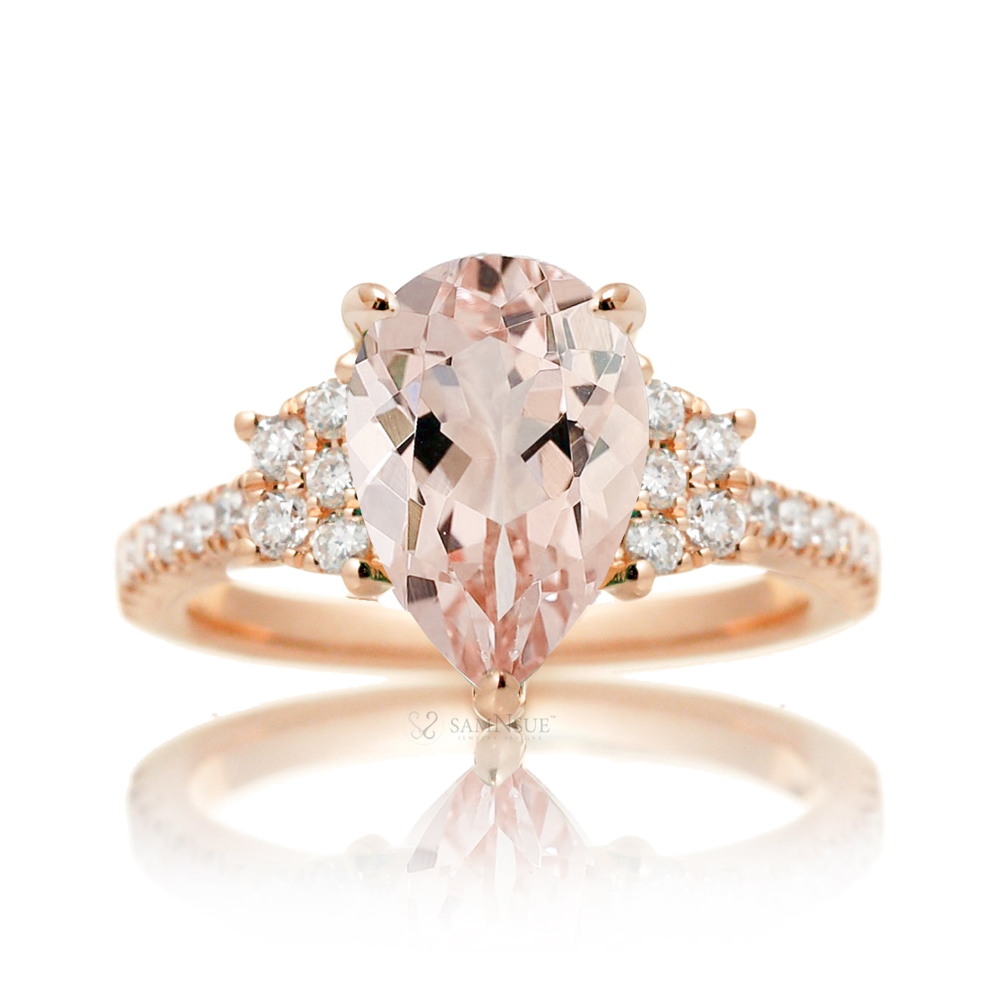 Pear morganite engagement ring with diamond accent in a trapezoid shape in rose gold