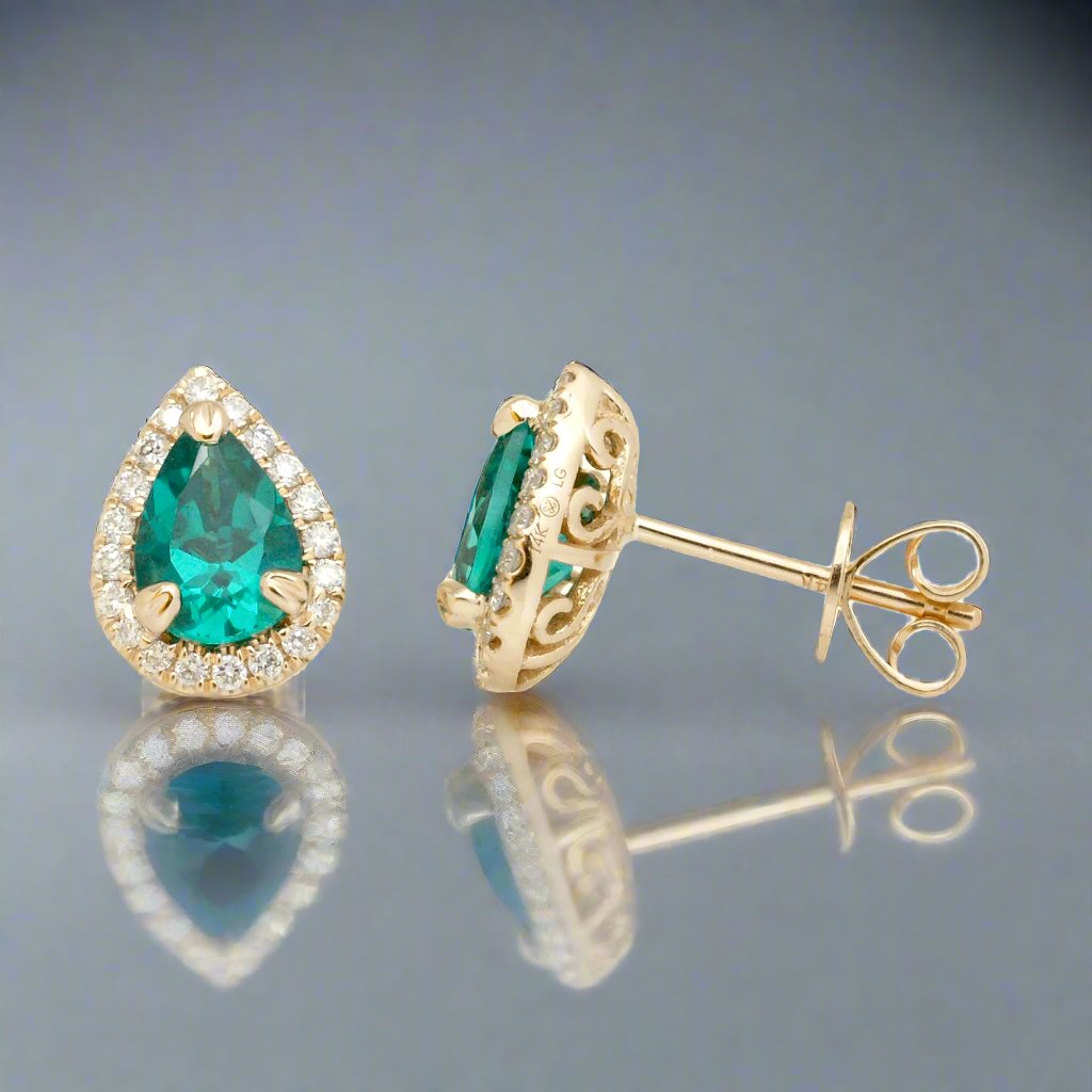 Pear emerald stud diamond halo earrings yellow gold