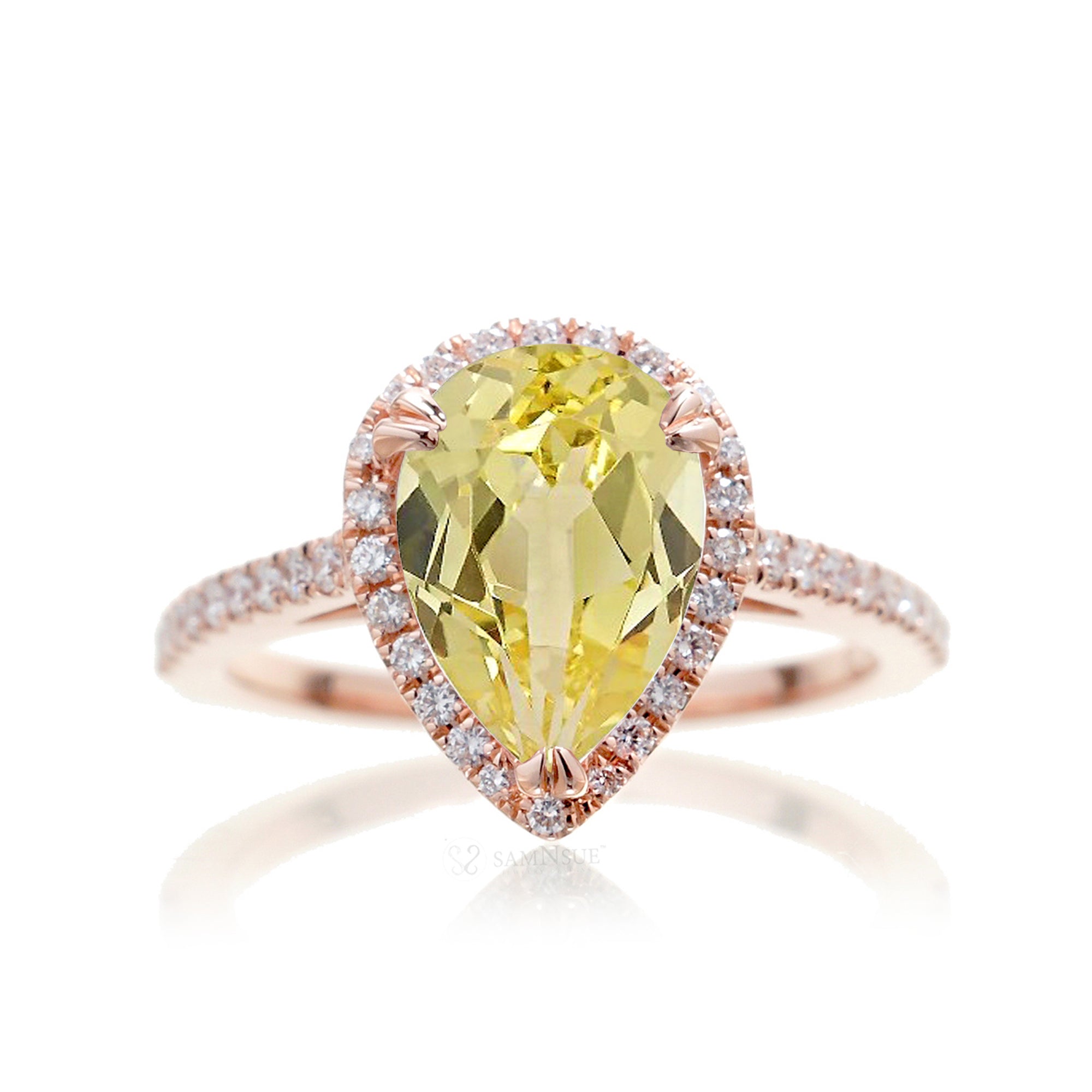 Pear yellow sapphire engagement ring with diamond halo 