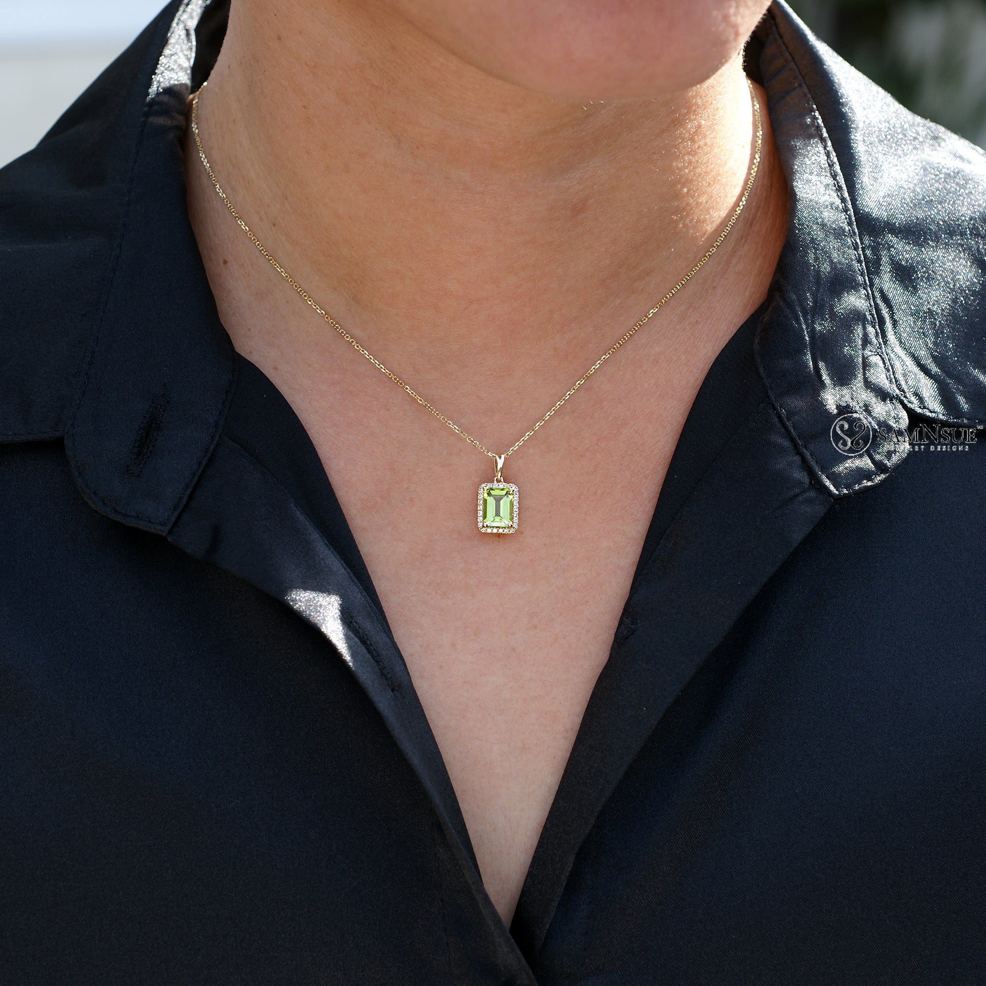 Peridot pendant with diamond halo and chain in yellow gold