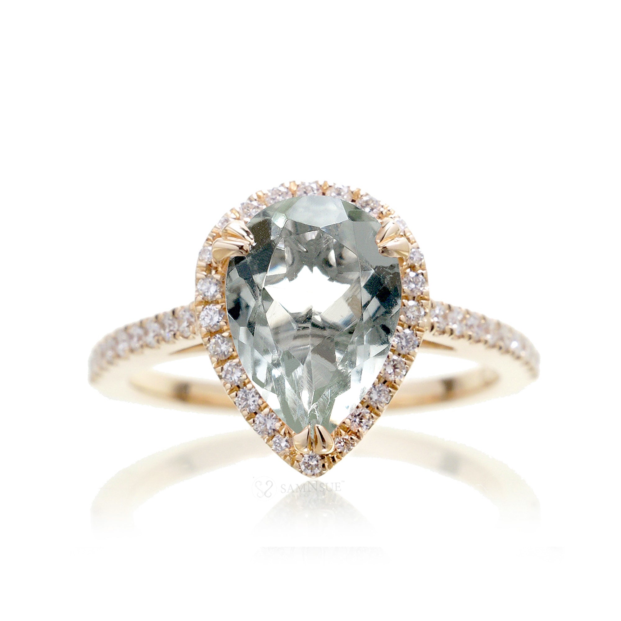 Prasiolite pear cut engagement ring with a diamond halo