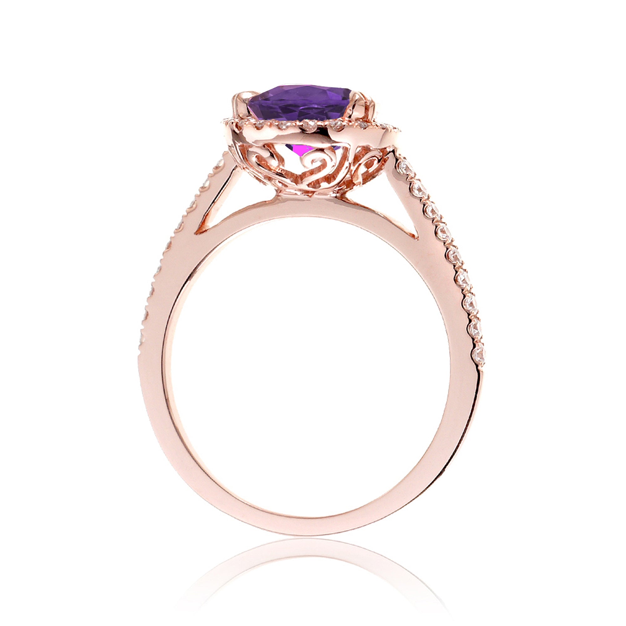 Oval cut amethyst purple sapphire engagement ring with a diamond halo in rose gold