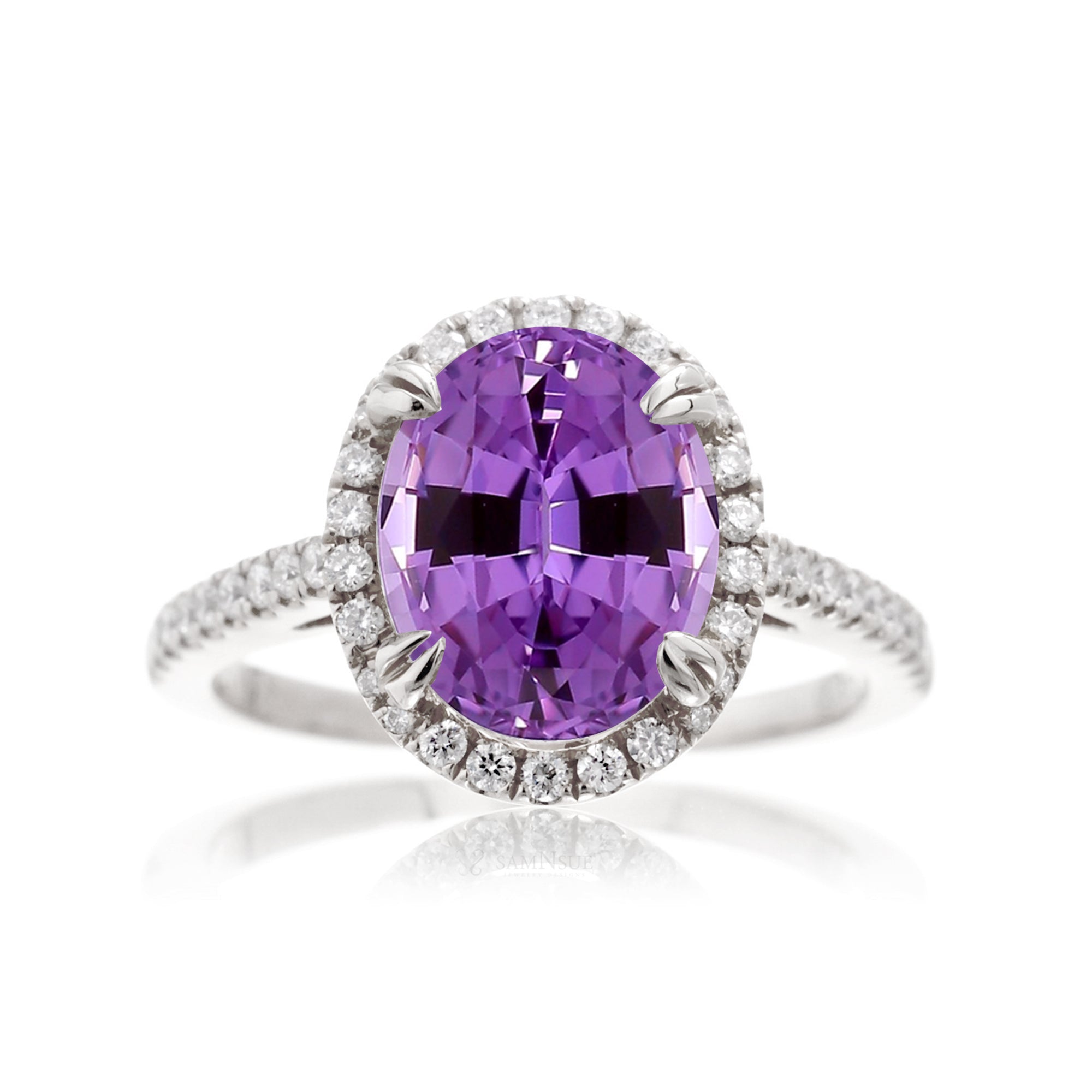 Oval cut amethyst purple sapphire engagement ring with a diamond halo in white gold