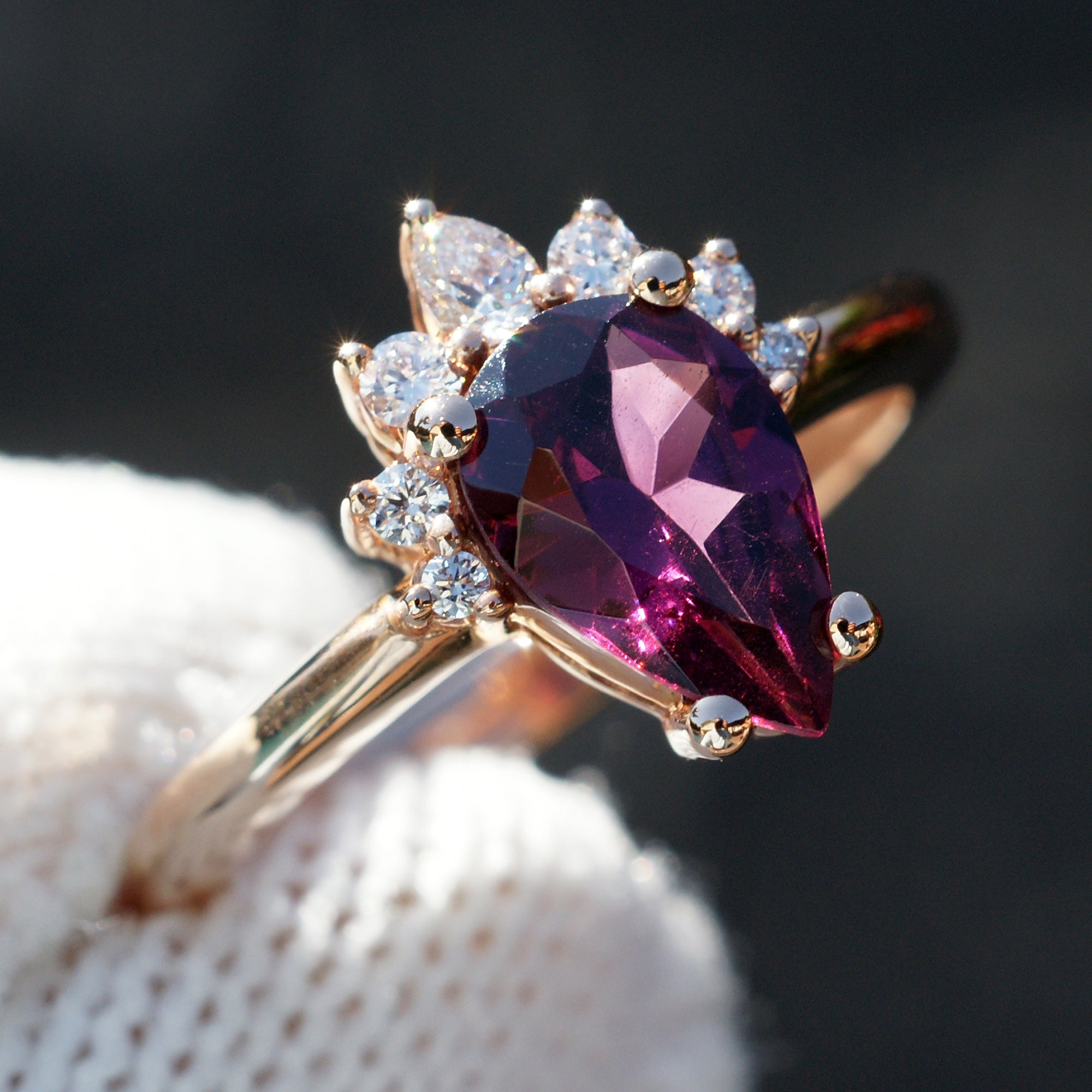 Rhodolite garnet pear half diamond halo ring in rose gold